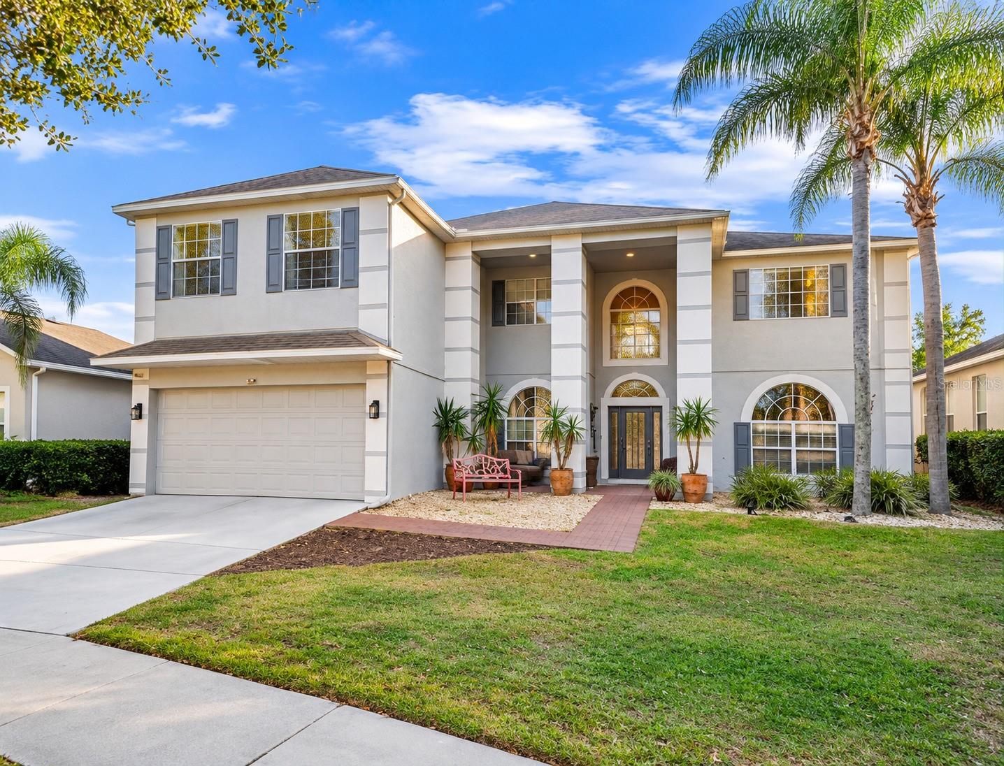 SPACIOUS TWO-STORY HOME IN WINTER GARDEN – 5 BEDROOMS, 5 LIVING AREAS & MORE!Discover this beautiful two-story home in Winter Garden, offering an ideal combination of space, comfort, and convenience. Featuring 5 bedrooms, 3 full bathrooms, and 1 half bathroom, this property stands out with an impressive five additional living areas, providing plenty of room for entertaining, relaxing, working from home, or creating spaces tailored to your lifestyle.The open floor plan creates a welcoming atmosphere, complemented by spacious living and dining rooms perfect for gatherings with family and friends. The beautiful kitchen features solid wood cabinets, elegant stone countertops, and included appliances, combining style and functionality for everyday living.The primary bedroom offers a walk-in closet, while the remaining four bedrooms feature built-in closets for convenient storage. With generous interior space and a versatile layout, this home is an excellent option for buyers looking for room to grow or investors seeking an attractive rental property.Additional highlights include a two-car attached garage and a convenient location near a major road, providing easy access to nearby amenities, shopping, dining, and well-regarded schools. Don't miss this opportunity to own a spacious and versatile home in desirable Winter Garden!