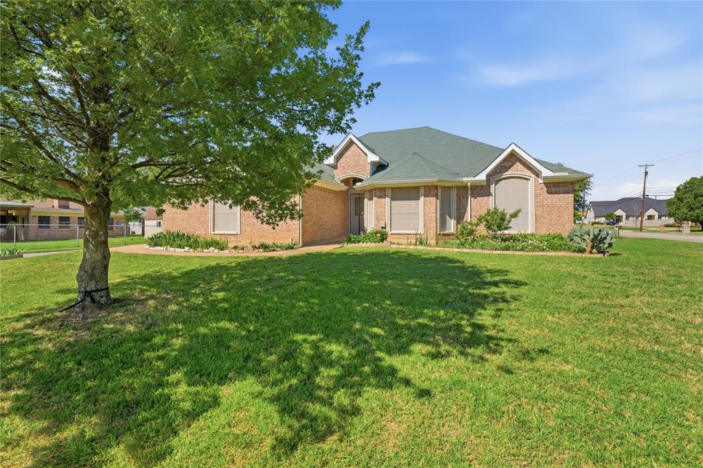 Spacious and well-designed home featuring a highly sought-after open floor plan. The large kitchen flows seamlessly into the eat-in dining area and expansive living room, complete with a wraparound breakfast bar—ideal for entertaining and everyday living.The oversized primary bedroom offers a private retreat with a Texas-sized en-suite bath. Bedrooms 2 and 3 are also generously sized, providing flexibility for family, guests, or a home office.Situated on a premium oversized corner lot, this property includes a rear-entry garage and a private slab driveway in the back—perfect for secure boat or RV parking.Located in desirable North Richland Hills, this home combines space, functionality, and convenience, making it a standout choice for buyers searching for open-concept homes with large lots and extra parking in the DFW area.