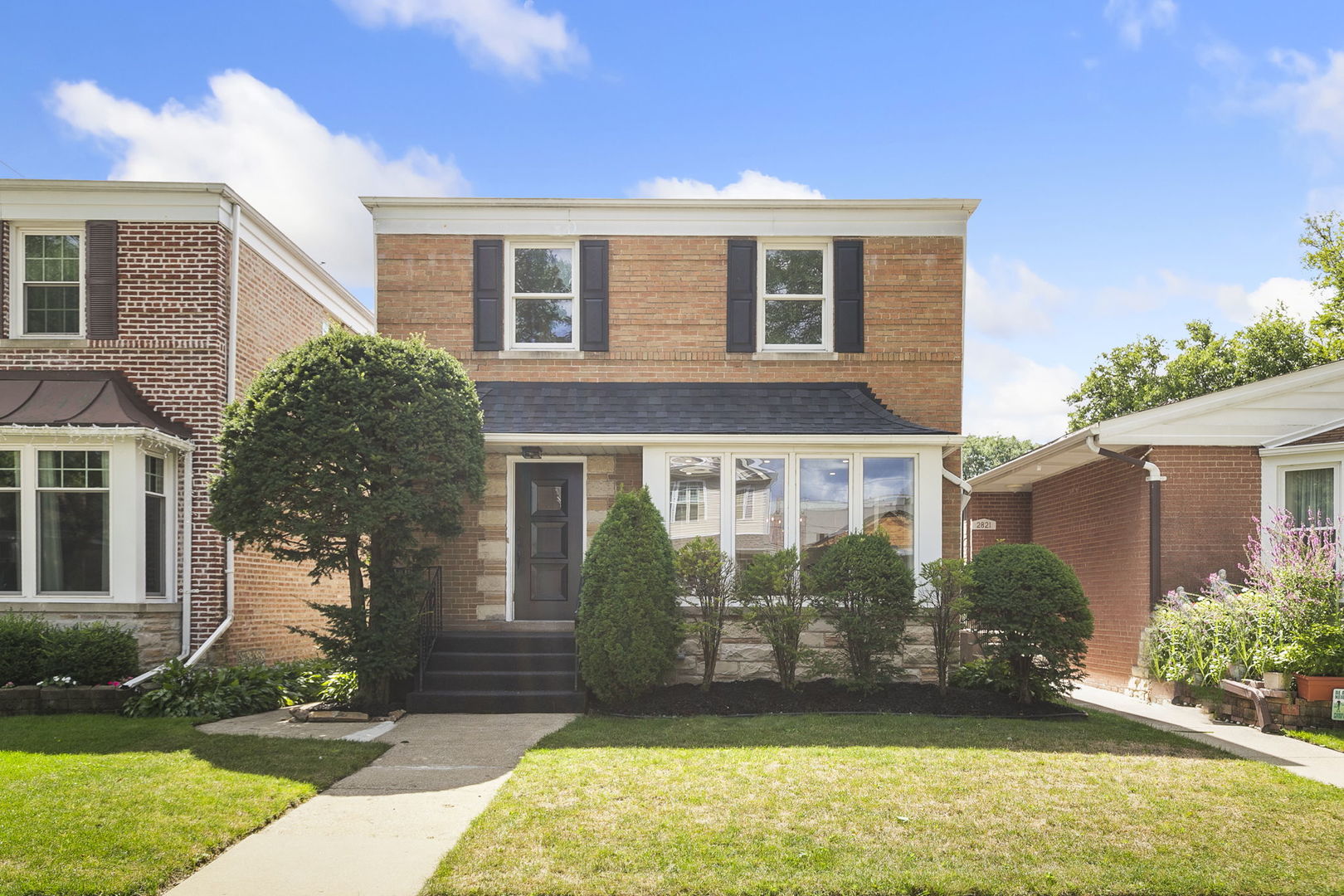 Welcome home to this completely re-imagined 4 bedroom, 2.5 bathroom, West Rogers Park all brick Georgian. Enter into the welcoming foyer and you're immediately greeted with a massive open living room with beautiful bay window for great natural light that really puts the oak floors on display. The living room leads into the large dedicated dining room with a back door that leads to the beautiful backyard with large patio, tons of green space, and two car parking pad. The main level is complete with an updated half bathroom, and incredible show stopper chef kitchen with beautiful cabinets, high end appliances including a double oven, dual dishwasher, custom range hood and dual sinks. The second level is highlighted with beautifully re-finished hardwood floors with a natural finish, 3 expansive bedrooms, and a stunning bathroom with designer quality finishes. This home truly checks all the boxes with a finished basement that includes a 4th bedroom, full bathroom, side by side laundry and separate mechanical room. The beautiful tree-lined street is a prime location with easy access to the areas best restaurants, parks, and public transportation. This home is truly turnkey, all that's left is to move-in!