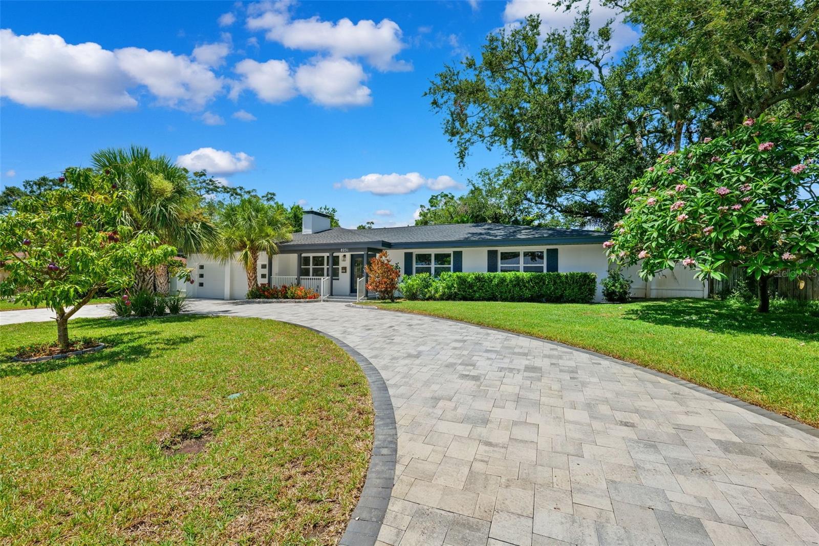 One or more photo(s) has been virtually staged. HIGH & DRY HOME! THE HOME DID NOT FLOOD DURING HELEN OR MILTON OR AT ANY OTHER TIME!!! Located in Jungle Prada Area, Dream Home – 8231 31st Terrace N | 4BR + Office | 3BA | 2,316 Sq Ft

Welcome to 8231 31st Terrace N — a rare find in one of Pinellas County’s most desirable neighborhoods. This beautifully updated 4-bedroom, 3-bathroom home, PLUS a private office, offers over 2,300 square feet of stylish, functional living space designed to embrace the Florida lifestyle.

Whether you're seeking multi-generational living, remote work convenience, or luxury in the heart of St. Pete, this home delivers.

Stylish Open Living + Dedicated Office Space
Enjoy a modern open-concept layout with sunlit living areas, neutral finishes, and upgraded touches throughout. A separate private office offers the perfect work-from-home setup, quiet study space, or hobby room, adding versatility to suit your lifestyle.

Entertainer’s Kitchen with Seamless Flow
The gourmet kitchen boasts sleek stainless appliances, quartz countertops, and ample prep space, flowing seamlessly into the dining and living areas—ideal for everyday living and entertaining guests.

Luxury Primary Suite with Cedar-Lined Closet
Your sanctuary awaits in the oversized primary bedroom, complete with a spa-inspired en-suite bath and a cedar-lined walk-in closet—a upgrade rarely found.

Private In-Law Suite with Spa-Style Shower or make it the Primary!
Located on the far side of the home, the 4th bedroom functions beautifully as an in-law or guest suite, featuring its own full bath and a walk-in shower with multiple body jets for a true spa experience and added privacy.

Three Beautifully Renovated Bathrooms
Each of the three full bathrooms features custom LED-lit mirrors, quartz counters, and designer fixtures, creating a high-end look and feel that adds both luxury and convenience.

Outdoor Living with Tropical Appeal
Curb appeal abounds with a high-end paver circular driveway and a gorgeous mature mango tree—enjoy fresh fruit and tropical vibes all year long. The spacious backyard offers room to create your dream Florida oasis, whether it’s a pool, garden, or outdoor kitchen.

Prime Location 4 miles to the Beaches, 8 miles to Downtown & Top Schools close to home.
Located just 8 miles from downtown St. Petersburg, 4 miles Gulf beaches, 3 miles top-rated schools, parks, and shopping, this location offers the perfect blend of accessibility and relaxed coastal living.

At a Glance:
4 bedrooms + private office

3 full bathrooms with LED-lit mirrors

2,316 sq ft of updated living space

Chef-style kitchen with stainless appliances

Oversized primary suite with cedar-lined closet

In-law suite with luxury walk-in shower + body jets

Pavered circular driveway & mature mango tree

Room for a pool or outdoor kitchen

Fantastic location in central St. Petersburg

New windows and doors 2023

New roof 2023

Schedule your private showing today!