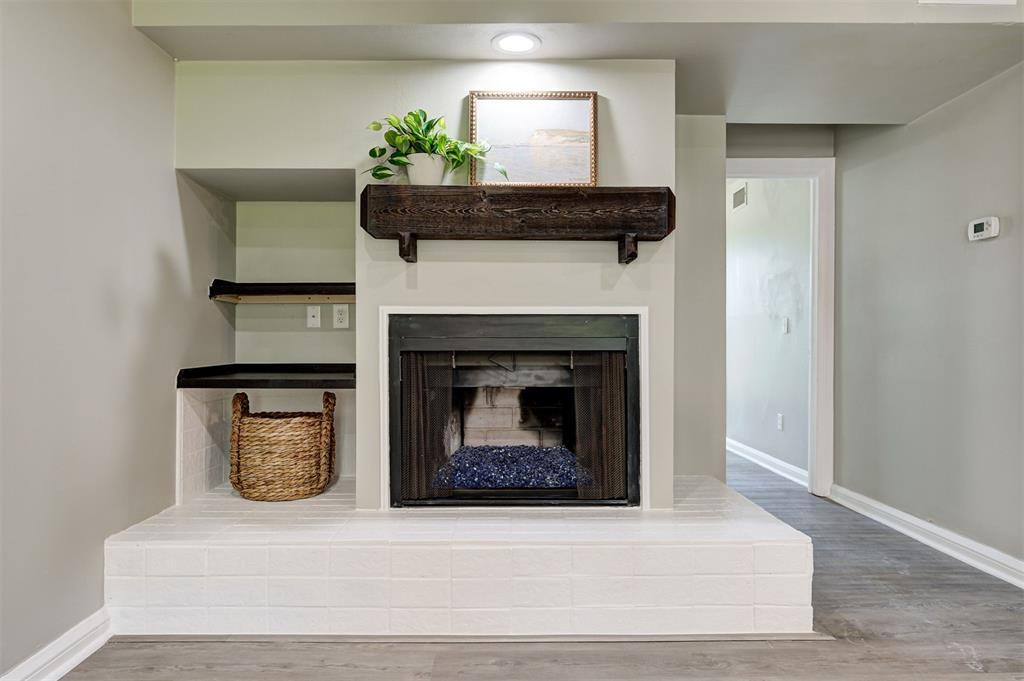 Are you looking for a lock-and-leave lifestyle? This beautifully renovated condo is positioned in the heart of downtown Oklahoma City. Ideally located near Scissortail Park, the Civic Center, Myriad Gardens, and Midtown, you'll enjoy walkability to some of the city's best dining, entertainment and parks. Located near OU Health Sciences Center and downtown Saint Anthony hospital, making it convenient for employees or students. This 2 bed, 2 bath condo is move-in ready and has been thoughtfully updated. New flooring throughout and fresh paint on all walls, doors, and trim. The updated kitchen boasts newly stained cabinets, new countertops, a convenient five-shelf lazy susan pantry, abundant pull-out storage, and extra cabinetry for all your culinary needs. The kitchen has been redesigned to accommodate additional seating with an added bar space—perfect for casual dining and entertaining. New light fixtures illuminate the space, while a striking cedar beam and mantel above the fireplace add warmth and character. Custom shelving in living and dining rooms provide even more storage solutions.Abundant natural light fills the home, creating a bright and welcoming atmosphere throughout. The versatile floor plan includes a dedicated office/flex space—ideal for working from home. The primary bedroom features a spacious walk-in closet with plenty more storage. Enjoy a beautiful pool and hot tub set among quiet, peaceful, professionally landscaped common areas with mature trees. The double-gated entrance provides enhanced security and peace of mind. Your covered parking spot is included. Embrace the ultimate lock-and-leave lifestyle, perfect for busy professionals or those who love to travel.