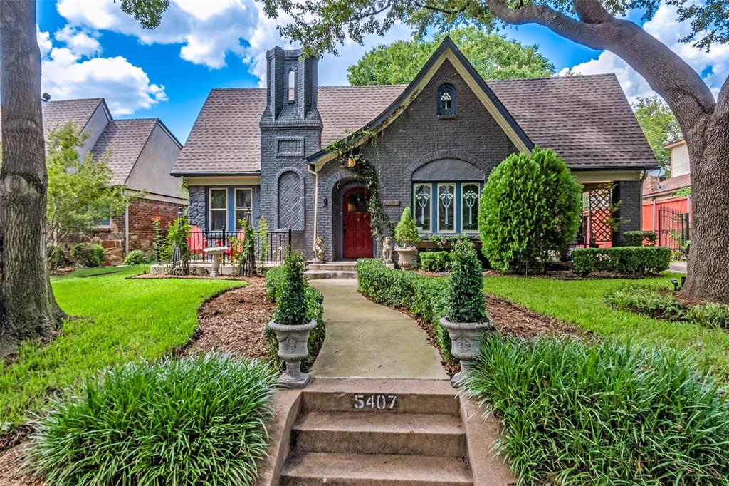 Located on one of the best blocks of the M-Steets, don’t miss this classic Tudor featuring an asymmetrical roof pitch, elaborate chimney, inset & arched front entry, covered side porch & prominent stained glass windows. The interior features updated island kitchen & baths, hardwood floors & a flexible sunroom-study. Backyard deck, garage with workshop, sprinkler system, recent gas line & French drain, radiant barrier & tankless hot water. This 4-bedroom, 2-bath, 2,200 sq ft home in the M-Streets offers a rare mix of original details and practical improvements. Restored hardwood floors, stained glass, and exterior doors maintain the integrity of the home, while major systems—HVAC, water heater, electrical panel, and driveway—have all been recently replaced. Grandfathered features like the 11’ privacy fence and painted brick add character you can’t recreate today. Quiet block, walkable location, solid value. The seller is having the roof replaced and buyer can have the option of selecting the shingle color depending on the contract and closing date.