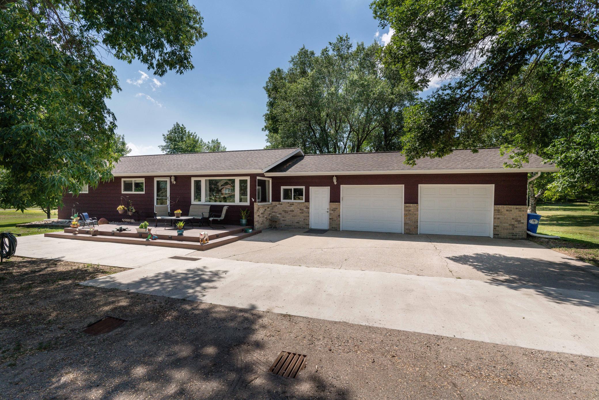 Enjoy this well maintained 4 bedroom, 2 bath rambler conveniently located on the edge of Fergus Falls.  This home is situated on a large 1.3 acre parcel that is great for outdoor entertaining.  The home features a galley kitchen with in-floor heat, pantry with pull out drawers, stainless steel appliances, informal dining room, beautiful hardwood floors, 3 bedrooms and full bathroom on main floor, lower level family room, large utility room, large breezeway, and a spacious bonus room (currently being used as a 5th bedroom) to be used for storage or whatever you want it to be.  Recent updates include a washer, backyard gazebo, raised rose garden and wifi garage door opener.  Remodeled rooms include kitchen, lower level family room, both bathrooms, and lower level bedrooms. The property also includes steel siding, 2 stall attached garage, and a detached shed/1 stall garage.  This home has been very well cared for and it shows!  Check out the list of home improvements!