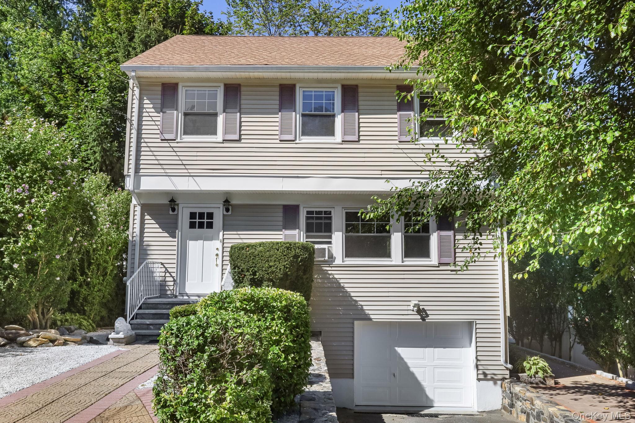 Welcome to this delightful Colonial-style home located on a peaceful residential street. This inviting property features three bedrooms and two and a half baths, offering a comfortable and functional layout. Finished basement, deck and level lot. A garage provides convenient parking and storage. With solid bones and classic charm, this home is ready for your personal touch. New roof! Come make it your own!