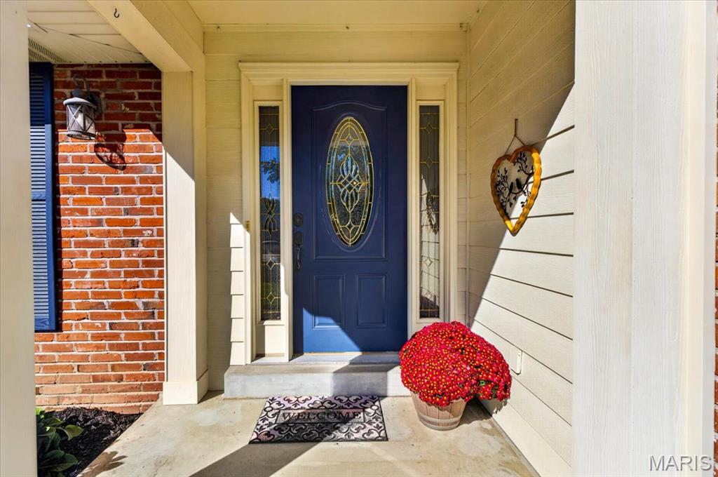 Located on a cul de sac in one of Chesterfield's most desirable neighborhoods in award winning Parkway West School District, this 4 bed, 3 bath ranch offers 3,800 square feet of living space and an open floor plan designed for everyday living. An inviting foyer leads to a living room and separate dining room, and an incredible family room beyond. With its vaulted ceiling, woodburning fireplace and built-ins, the family room is the hub of the home and adjoins a beautiful breakfast room set into a bay window overlooking the lovely composite deck and backyard beyond. The updated kitchen features newer appliances, granite countertops and a generous main floor laundry room. The spacious primary bedroom suite and three additional bedrooms are welcoming, and both main level baths feature tiled showers, updated vanities and flooring. The lower level is a wonderful surprise, with a large family room/rec room, full bath, bonus room, perfect as sleeping quarters or office space, an exercise/bonus room and loads of unfinished storage. The .29-acre yard is lush and private and backs to woods and open ground. A two-car garage adds convenience, and newer HVAC, appliances, and a 3-year old roof mean buyers can move in and enjoy. Just minutes from parks, shopping, dining, and major highways, this home combines generous living space, a great layout, and an exceptional Chesterfield location.