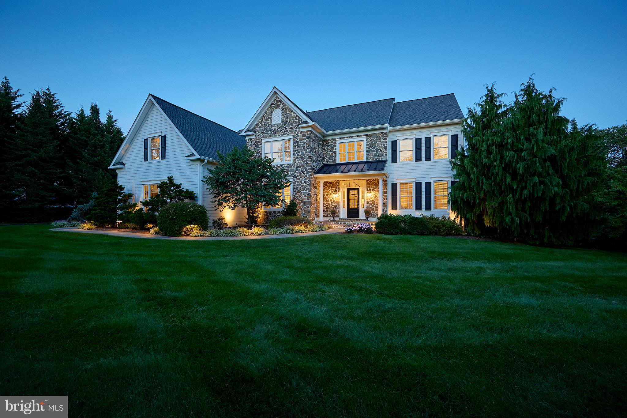 A Truly Exceptional Chester Springs Residence- where custom craftmanship, privacy, and resort style living come together. Perfectly positioned on a premium lot backing to protected conservancy, 48 Lily Pond is a remarkable residence offering an extraordinary combination of quality construction, sophisticated upgrades, and spectacular indoor and outdoor living. Thoughtfully enhanced throughout and meticulously maintained, this is a home that stands apart. A dramatic two story foyer with sweeping curved staircase sets the tone, introducing an interior defined by beautiful architectural details, generous proportions, and abundant natural light. Entertain family and friends in the well-appointed living and dining rooms -the HEART of the home is the custom Paradise kitchen- a true showpiece, beautifully designed with exceptional inset cabinetry, quartzite counters, including a Rise 48" Dual Fuel Professional Range with chrome infused griddle, Panel ready Built In Jenn Air French Door Refrigerator, under counter ice machine with articulating range/Jenn Air and thoughtful details throughout. Created for the serious cook yet equally suited to entertaining, it is a space where craftsmanship and functionality come together effortlessly. The adjoining grand two-story fireside family room boasts a wall of windows and a secondary staircase to the upper level. A private first floor study provides an elegant and functional work from home retreat. Luxury continues throughout the home. The inviting primary suite includes a sitting room and an updated master bath - Goebel custom vanities with inset custom cabinetry, Carrera marble, soaking tub, heated floors, and expansive shower- elevated designer finishes—just one example of the exceptional attention to detail found throughout this residence. Three additional generously sized bedrooms and two additional well-appointed bathrooms complete this level. The finished walkout lower level dramatically expands the living and entertaining space and includes a large recreation area, private den, and full bath: and provides direct access to an extraordinary backyard retreat.   Outside, the setting rivals a private resort. A Bond Beam inground pool surrounded by expansive hardscaping is complemented by a maintenance-free deck with a covered area, creating multiple spaces for dining, entertaining, or simply relaxing at days end. Beyond the pool, the property backs to conservancy, providing a beautiful natural backdrop and an exceptional sense of privacy.  The exterior was refreshed in recent years with Hardi Plank / stone exterior, roof in 2024, new gutters and downspouts, new Timber Teck deck with metal railings and deck roof, new garage doors and openers, landscape lighting front and rear.  meticulously enhanced and maintained, this home offers the confidence of newer systems and extensive exterior udates, allowing the next owner to simply move in and enjoy. From its premium culdesac setting and conservancy views to its custom kitchen, luxurious baths, dramatic architecture and resort caliber outdoor lining, 48 Lily Pond is far more than a beautiful home- it is a rare Chester Springs offering where quality, privacy, and lifestyle come together exceptionally well.