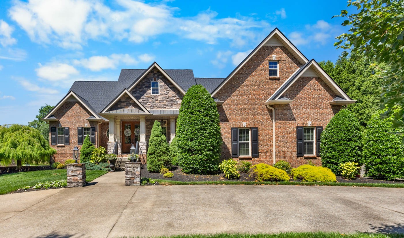 It's not just a home, it's your own private retreat! This gorgeous all-brick home offers over 4,800 sqft of exceptional living space with 4 bedrooms, 4.5 bathrooms, and endless upgrades inside and out. The main level features a formal dining room, spacious living room, updated kitchen with quartz countertops, gas cooktop, pantry, and eat-in area—plus a cozy den, utility room, and three bedrooms including the primary suite. Step into a spa-like retreat in the luxurious primary bathroom, featuring double vanities with sleek finishes, a freestanding soaking tub perfect for unwinding, and a glass-enclosed shower loaded with all the bells and whistles—think rainfall showerhead, body jets, and designer tile.Upstairs, you’ll find an additional bedroom, full bath, and a spacious bonus room. The fully finished basement is ideal for entertaining with a second kitchen, bar, living room, flex room, full bath, and additional dining space. The home is stunning, BUT the real show stopper is the private backyard—no backyard neighbors, a heated saltwater gunite pool, with grotto, gas fire pit, and a pool house complete with half bath and storage. Major updates include a newer roof (2023), whole-home gas generator (2023),  gas grill, refinished cool deck, pavers, and Trex decking (2024). This home is a rare blend of luxury, function, and comfort—perfect for everyday living and unforgettable gatherings, tucked away right in the heart of Clarksville.