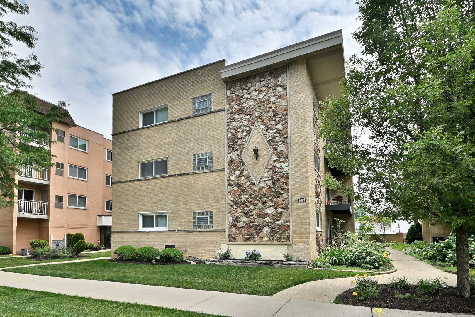 Heart of Edison Park!  Pristine location,  walking distance to Metra, restaurants, yoga studio, shops and  soon to open EP grocery store!  Large second floor unit has hardwood floors, updated kitchen with granite, stainless appliances, and updated bathroom.  Great closets in bedrooms and bonus closet in living room and sunny balcony! Basement has coin laundry and storage. Heat is included in assessment, and building has new boiler and new roof!