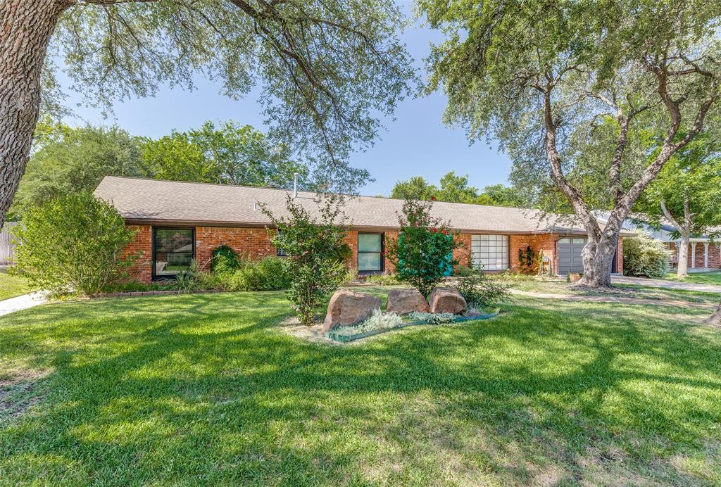 Holy smokes!  A four bedroom house with a massive yard AND it is in a great neighborhood?  You found it!  This home has been painstakingly updated without losing its charm.  New bathrooms, kitchen, new fencing, foundation repaired with warranty, and actual solid core doors are just a few of the upgrades that await you.  Need an in home office or a place for your hobbies?  Well this home has its own climate controlled sunroom that is absolutely massive.  The backyard has a built in firepit for relaxing, and if you want to play the host there is a pavilion out back sheltered from the Texas heat.