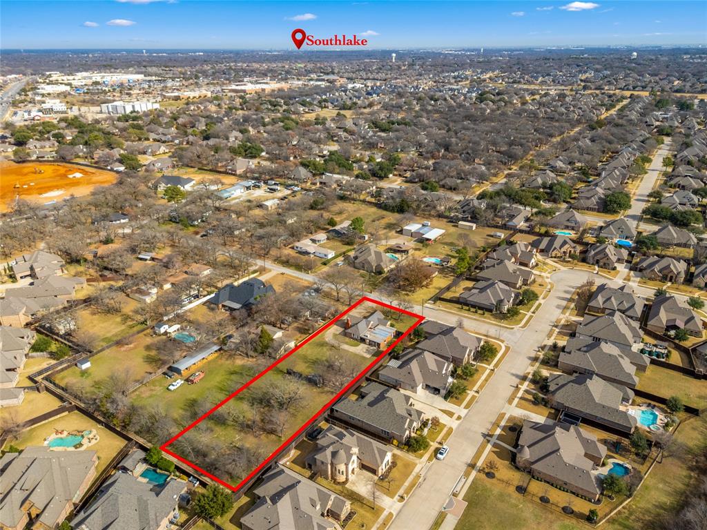 AS-IS property. Value is in the land. Rare opportunity to own an almost 1-acre lot on a quiet, tree-lined street in the heart of North Richland Hills. The existing home has no contributory value and will require demolition and rebuild. Bring your builder and create a custom residence on one of the largest residential lots in the area. Conveniently located near parks, shopping, dining, and major roadways. Opportunities like this are extremely rare — ideal for builders, investors, or buyers looking to design a custom home in an established neighborhood. Site evaluation and custom floor plan design are available. Buyer to verify building requirements, zoning, and utilities.