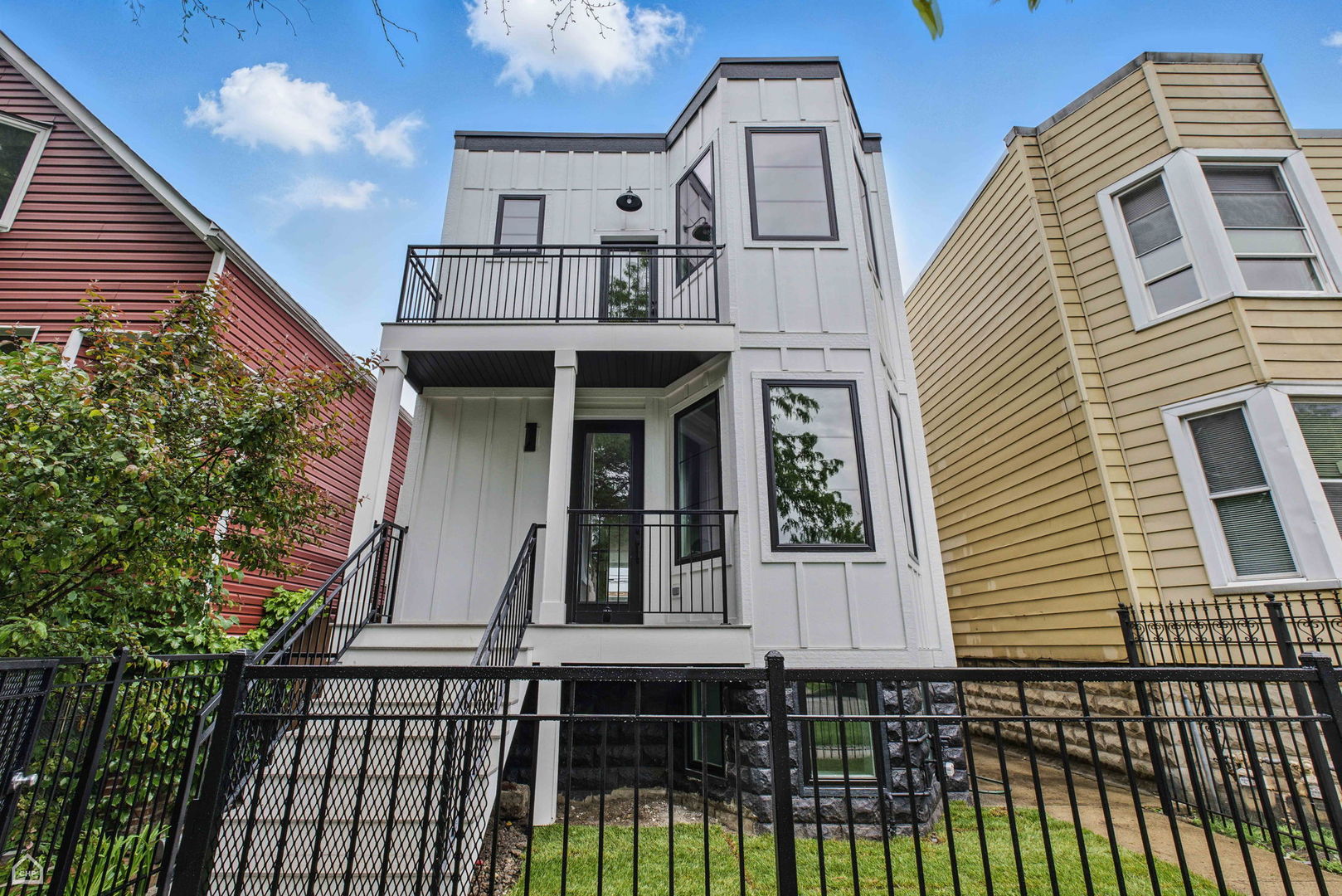 Don't miss the opportunity to own this stunning, fully renovated single family home in the heart of Logan Square. Meticulously remodeled, this 5 bedroom, 3.5 bathroom home pairs high end design with superior attention to detail. The entry opens to a bright and airy dining room featuring expansive wide-plank flooring, detailed custom millwork, and a gas fireplace with a quartz surround framed by arched built ins.The chef's kitchen features double stacked custom white cabinetry, a premium stainless steel appliance package, and a handcrafted wood wrapped hood. A striking quartz waterfall island anchors the space. The kitchen flows into a relaxing family area enhanced by custom built in shelving, providing elegant storage while maintaining a streamlined design. Upstairs, the luxurious primary suite includes a private deck, an expansive walk in closet, and a spa caliber ensuite bath. This retreat features floor to ceiling Calacatta marble tile, a double vanity complete with a soaking tub, rain showerhead, and handheld body spray. Two additional bedrooms, a full bath, and a well appointed laundry room with side by side machines and floating shelves complete this level. The fully finished lower level offers exceptional flexibility with a generous rec room, a sleek quartz topped wet bar and wine fridge, two additional bedrooms, and a full bathroom. Additional features include a functional mudroom off the rear entry, zoned HVAC, a backyard, and a detached 2 car garage. Ideally located just steps from the Armitage restaurant row, Palmer Square, the 606 Trail, and within easy reach of the Logan Square Blue Line and Healy Metra Station. Designed with both style and function in mind, this Logan Square beauty offers exceptional living in a prime location. Schedule your private tour today and make this Logan Square gem your own.
