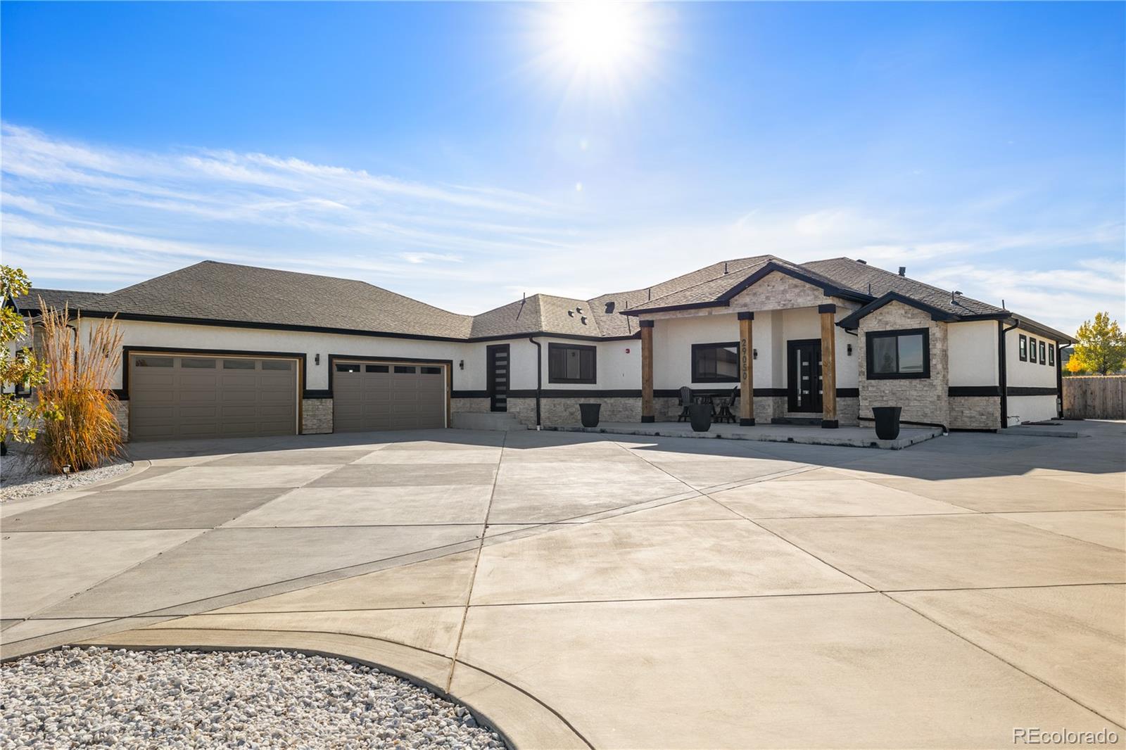 This one-of-a-kind estate combines timeless elegance with modern comfort, nestled on a beautiful corner lot spanning 2 acres of meticulously landscaped grounds. Designed for both everyday living and sophisticated entertaining, this 5-bedroom, 6-bathroom home captures the perfect balance of luxury and warmth.

The main level showcases an exquisite primary suite with his-and-hers closets, a serene hot tub, and an oversized walk-in shower. Two additional bedrooms, each with their own private ensuite and walk-in closet. A spacious main-level laundry room with a built-in dog shower adds thoughtful convenience to daily life.

Bathed in natural light, the open-concept living area is framed by large windows that highlight the surrounding landscape. A grand fireplace creates a striking focal point in the living room, setting the tone for cozy gatherings and relaxed sophistication.

The fully finished basement offers a sprawling; open space designed for entertaining or unwinding. It features a stylish wet bar, an electric fireplace, a fourth bedroom, and a fifth bedroom or optional room. The possibilities are endless, allowing for both comfort and creativity in how the space is enjoyed.

Step outside to your private oasis: a stunning, year-round tempered pool, a hot tub, a playground, and a huge, covered patio perfect for alfresco dining or quiet evenings surrounded by nature, a dog run with an electric fence running the entire property. The landscaping is truly breathtaking, with every detail curated to create beauty and tranquility. Ample parking and a dedicated home office ensure the property is as practical as it is luxurious and let's not forget the oversized heated garage including RV and Electric hook up.

This home is more than a residence it’s a statement of refined living, where every feature has been carefully considered and every space tells a story. It must be seen in person to fully appreciate the craftsmanship, comfort, and undeniable charm it offers.