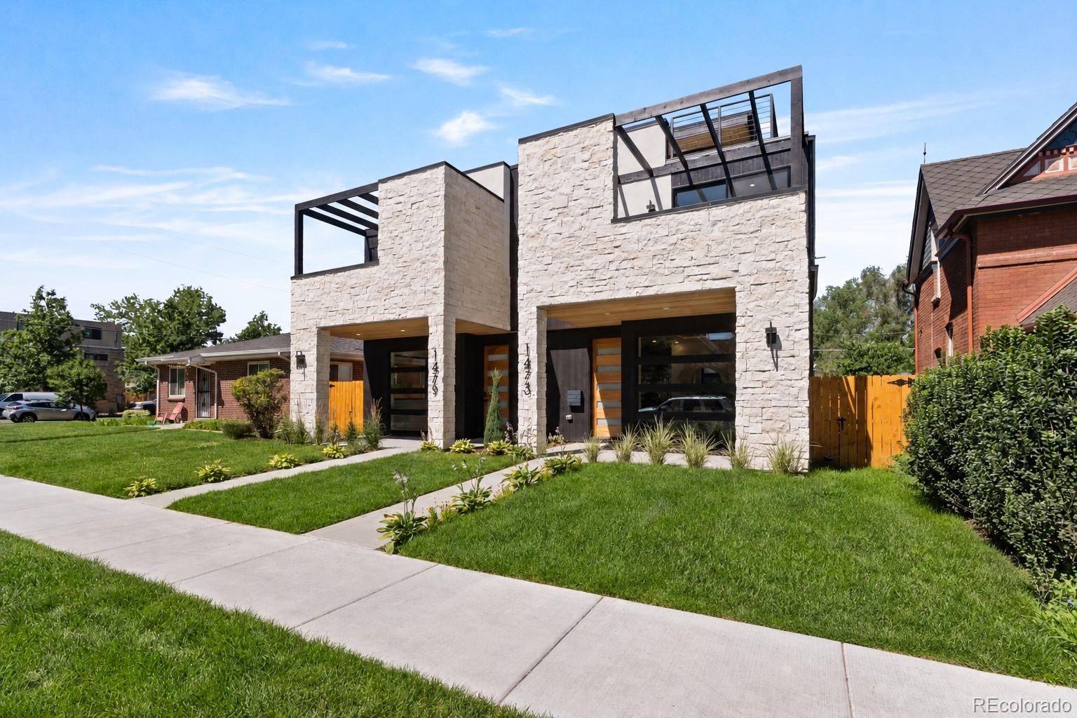 Perfectly positioned just one block from Platte Park and the vibrant shops and Michelin star restaurants of Pearl Street, this thoughtfully designed duplex showcases PBG's commitment to exceptional craftsmanship and modern architecture. The 4-bedroom, 5-bath residence blends timeless materials with clean, contemporary design. Wrapped in natural limestone, sleek stucco, and modified wood accents, the exterior delivers a refined architectural statement. Inside, wide-plank engineered white oak flooring and expansive windows create a bright, welcoming interior, where stone feature walls and wood slat ceiling accents elevate the home's cottage transitional design. The main living space is anchored by a elegant fireplace wrapped in quartz & stone. Designed for both everyday living and entertaining, the chef's kitchen showcases quartz countertops, custom American-made cabinetry, Thermador appliance suite, island with additional storage, and a dedicated butler's pantry.Upstairs, the primary suite features a private balcony and spa-inspired bath with a freestanding soaking tub, glass-enclosed dual-head shower, private WC, his and hers closets, and heated floors. A secondary en-suite bedroom and spacious laundry room complete the upper level.The rooftop level offers flexibility with a bedroom that can double as an office, an office, ¾ bath, wet bar, and expansive deck ideal for entertaining that supports a jacuzzi. The finished basement with soaring 10-foot ceilings expand the home with a recreation area, wet bar, full bath, and additional bedroom.Private backyard with gas hookup. Benches near the living room to be added (see rendering). Home features extra insulation in party and exterior walls, an ERV system, dual HVAC  systems, a high-performance electric water heater, and a detached two-car garage with 220V capability and overhead storage. PBG industry leading 2-year builder’s warranty/8-year structural warranty. | No HOA |Buyer to Verify All Details