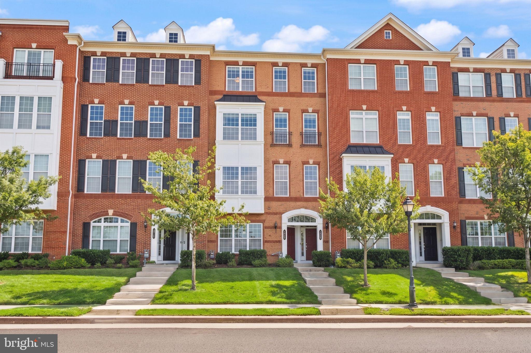 Come see this spacious top-floor, townhouse-style condo offering nearly 2,500 sq. ft. with 3 bedrooms, 3 bathrooms, two private balconies, and beautiful western-facing mountain and sunset views! Real hardwood floors flow throughout the main living areas, while the open-concept kitchen features granite countertops, stainless steel appliances, abundant cabinetry, and a large center island—perfect for everyday living and entertaining. The spacious primary suite provides a relaxing retreat, while two additional bedrooms offer plenty of flexibility for family, guests, or a home office. Located along the outer edge of the community, the western exposure provides a more open feel and incredible sunsets from both private balconies. Enjoy an amenity-rich community with pools, fitness facilities, trails, sport courts, playgrounds, and clubhouses. Just minutes from Brambleton Town Center, Ashburn Metro, Dulles Greenway, major commuter routes, and Dulles International Airport. Top-floor living, exceptional space, two private outdoor areas, and a fantastic Ashburn location make this one you won't want to miss!