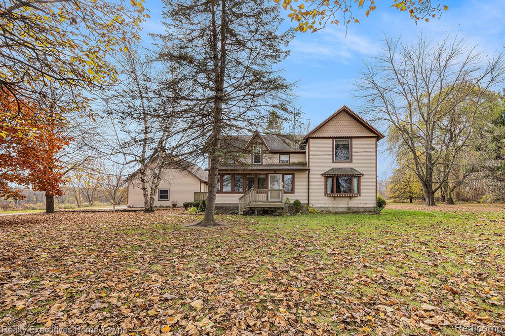 Prepare to fall in love with this classic country farmhouse perfectly situated on a beautiful 10-acre parcel featuring open land, mature trees, and a large picturesque pond. With over 2,100 sq ft of living space, this 3-bedroom, 2-bath farmhouse offers the ideal blend of rustic charm and everyday comfort. Inside, you’ll find spacious living areas filled with natural light, a warm and welcoming make this home truly special. The property includes a huge 3-car attached garage, a large hay barn, and an oversized detached garage — ideal for storage, a workshop, or hobby farming. Step outside and enjoy peaceful mornings overlooking the pond, evenings on the porch, and endless room to roam, garden, or entertain. Whether you’re seeking space for your family, land for your equipment or animals, or simply the serenity of country living, this one checks all the boxes. A rare opportunity to own a home that combines farmhouse character, functional outbuildings, and a stunning natural setting with your very own pond!