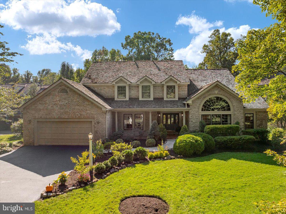 Unique opportunity to transform your lifestyle and experience the unparalleled benefits of LAKEFRONT LIVING! Waking in the morning and launching a kayak from your PRIVATE DOCK, strolling the lushly landscaped grounds of your wooded oasis, hosting a summer gathering from the WRAPAROUND DECK while guests enjoy waterfront views, sipping a nightcap from your primary suite balcony watching the sunset… the possibilities are endless. Ideally located in a quiet North Reston enclave of homes along the shoreline of Champion Lake, 1358 Lake Forest Court is waterfront living at its very finest -  with over 6000 square feet of lovingly maintained and thoughtfully updated living space and a rarely available MAIN LEVEL PRIMARY BEDROOM floorplan. This stunning THREE-SIDES-BRICK Colonial boasts soaring ceilings and architectural windows, with incredible natural light and breathtaking views. Gleaming hardwood floors extend from the welcoming two-story foyer into the living room (with impressive cathedral ceiling) as well as the spacious formal dining room, with elegant molding and trim and convenient butlers pantry connection to the kitchen. Culinary enthusiasts and microwave chefs alike will appreciate the gourmet kitchen, centered around a custom oversized butcher block island with seating, and featuring oak cabinets, quartz countertops, and a JENNAIR APPLIANCE PACKAGE. For casual dining, gather in the breakfast room, with volume ceiling and masonry fireplace. At the heart of the home, a TWO-STORY FAMILY ROOM enhanced by signature geometric transom windows, built-in bookcases and a wood-burning fireplace. The expansive primary suite offers a sitting area, balcony overlooking the lawn and lake, and luxurious bath duel vanities, makeup station, soaking tub, and separate shower. On the other end of the home, the study can function as a home office space or a second main level bedroom. Three upper level bedrooms; one with en-suite bath and a Jack-and-Jill style bathroom connecting the other two. The WALK-OUT LOWER LEVEL is home to a sprawling recreation room with flexible multi-use spaces, including a gaming area, home theater, and wet bar. There’s also a full bath, generous storage, and configuration for future full kitchen install. You can appreciate your enviable surroundings from a variety of exterior living spaces, including wraparound deck with coordinating pergola, gazebo, covered patio, as well as the extensive grounds. RECENT IMPROVEMENTS include CertainTeed cedar roof, 6-ton capacity HVAC system for lower zone, 75 gallon hot water heater, repaved driveway, new oak floors in and around the kitchen, new upper level carpet, repaint of exterior trim, re-sealing of deck and docs, and more! Champion Lake’s annual HOA dues include lake maintenance, landscaping of common areas, stocking the lake with fish, a community dock and floating walkway – plus trash removal! No membership in the Reston Association required (but you can still purchase a pass to visit their pools and sports courts!) and the intimate self-managed community has various social events and gatherings throughout the year. Enjoy a serene vacation lifestyle without the travel; instead you can appreciate the convenience that epitomizes North Reston living - just minutes from major roads, Metro, Reston Town Center & North Point Village shopping! Properties like this don’t come around often. It’s time to realize your dream of living lakeside in Reston.