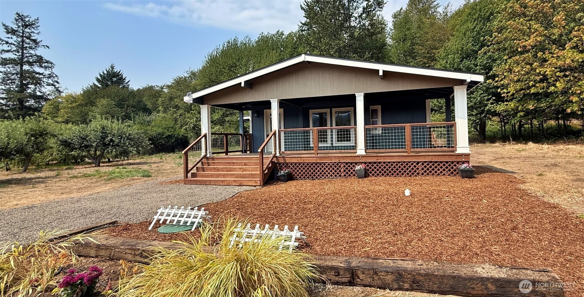 Tastefully remodeled 3 bed/2 bath plus office on 2 acres. Beautiful covered decks add 500 sq.ft of outdoor living space.  The spacious interior has vaulted ceilings and an open concept living space. There is new laminate flooring throughout, with updated fixtures, new appliances , new kitchen with beautiful countertops and cabinets. Fresh paint inside and out! Everything shows like a new home. Plenty of room for a garden with a mature fruit orchard already established. So many apple varieties here! With the great Southern exposure, you can bring your own vision to make this yard into your dream. FIVE minutes to Riffe Lake. Five minutes to Taidnapam Park and the Cowlitz River. Ski White Pass with a short drive and forage the Gifford Pinchot! Find solitude in the quiet life, no stop lights, no traffic and lots of forest friends to enjoy! Come take a look today!