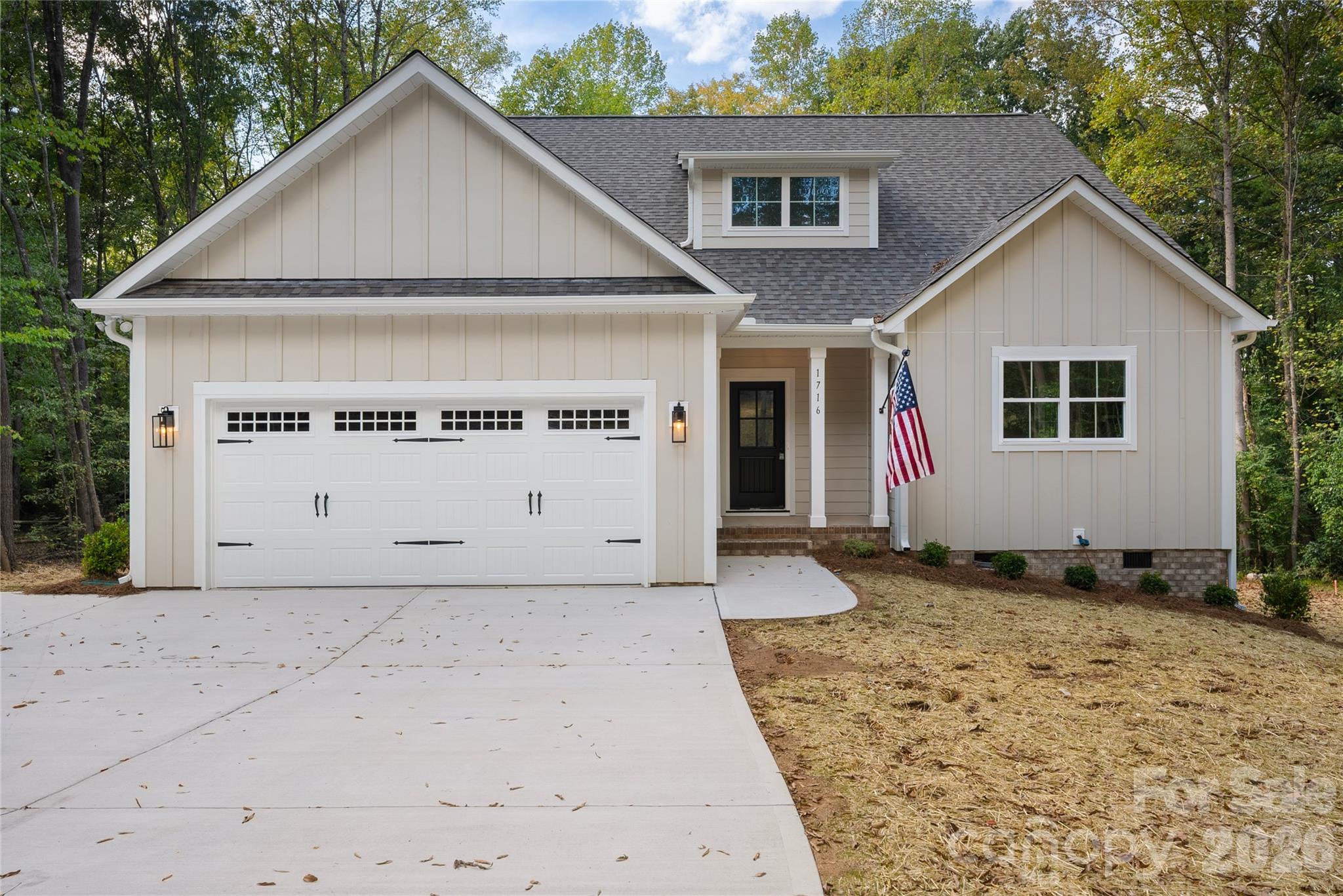 This New Construction home in Monroe built by Pinnacle Homes USA offers four bedrooms and three and a half bathrooms, with the Primary Suite on the MAIN level! This inviting property combines modern and stylish finishes and convenient living on a peaceful lake view lot. Durable LVP flooring on the main level, and quartz countertops throughout the home. Enjoy peaceful water views from the back deck, with patio pad underneath, perfect for relaxing, entertaining, and enjoying the outdoors. The yard has been seeded and strawed, providing a fresh foundation for future landscaping. This home also offers storage space beneath the house, including a spacious crawlspace with room for outdoor equipment and more. Conveniently located with quick access to Highway 74, this property provides both tranquility and accessibility. This home is a must-see. PLUS, Builder is offering $7,500 IN CLOSING COSTS! (ONLY if buyer uses approved lender & attorney) Schedule a showing today and experience all that this Lake Lee property has to offer! Call listing agents for more details.