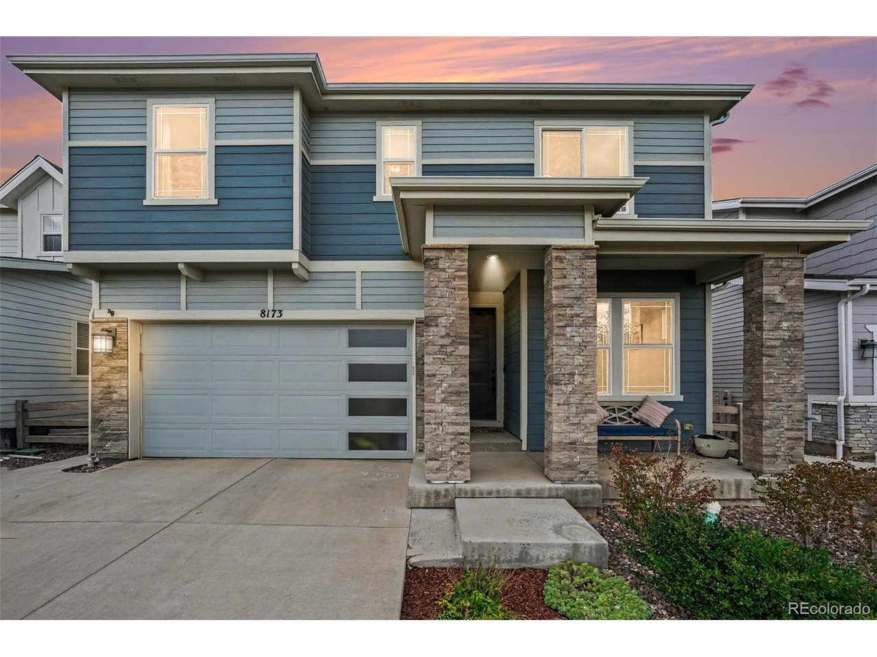 Nearly new, beautifully upgraded, and designed to take full advantage of Colorado living, this 2022 Sterling Ranch home stands out from the moment you arrive. The southeast-facing front helps the morning sun go to work on winter ice, while the backyard and spacious primary suite capture beautiful views of the surrounding hills.Inside, soaring ceilings and an open, light-filled layout create a dramatic first impression. An extra-wide sliding glass door with side glass panels brings in abundant natural light and opens to the covered outdoor living area. The upgraded kitchen features granite counters, a large island, stainless appliances, gas cooktop with hood, double oven and an oversized pantry. Eight-foot doors on the main level add to the upscale feel, while a private office with French doors provides a great work-from-home space.Upstairs, the oversized primary suite includes hill views, a large walk-in closet and 5-piece bath. Two additional bedrooms, a loft and convenient upstairs laundry round out the second floor. The unfinished basement offers more than 1,200 sq. ft. of future potential, and the 3-car tandem garage gives you room for vehicles, toys or storage.Outside, enjoy professional landscaping, a covered rear deck/patio, terraced retaining walls and a private yard. The sellers also upgraded the exterior paint beyond the original builder-grade finish.Sterling Ranch offers miles of trails, parks, open space with Chatfield State Park, Roxborough State Park and Waterton Canyon nearby.  Don't forget to visit the FANTASTIC staffed Overlook Clubhouse with fitness center, pool and community gathering spaces. The neighborhood Swan River Park with playground is 2 blocks to the north. Also, with Sterling Ranch HOA/community amenities are included through the metro district rather than a separate monthly HOA fee. You will love this home and all that it has to offer!