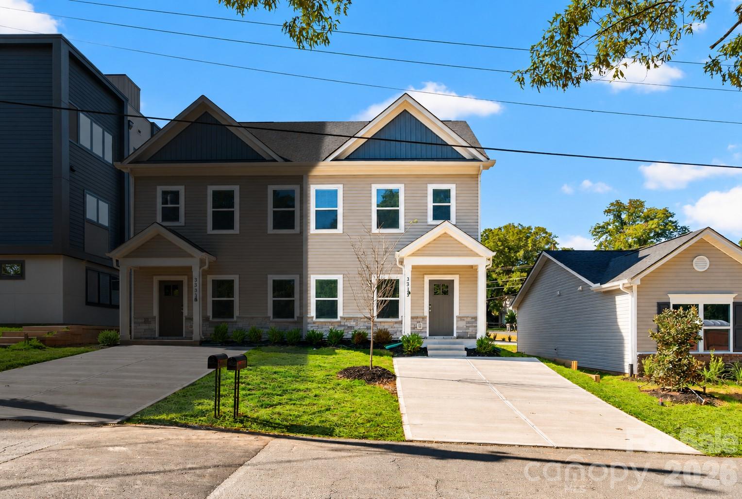 Newly constructed 3 bed / 2.5 bath townhome with NO HOA in Charlotte’s rapidly growing Enderly Park! Move-in ready and built with quality in mind, this modern property features a bright, functional layout on a main-level slab with all bedrooms situated on the upper level. Includes a refrigerator, a 1-year builder's warranty, and a 10-year structural warranty for complete peace of mind. With NO HOA fees, it is perfectly suited for an owner-occupant or a turn-key investment property in one of Charlotte’s most vibrant upcoming pockets! The adjacent unit is also available and can be purchased together as a package.