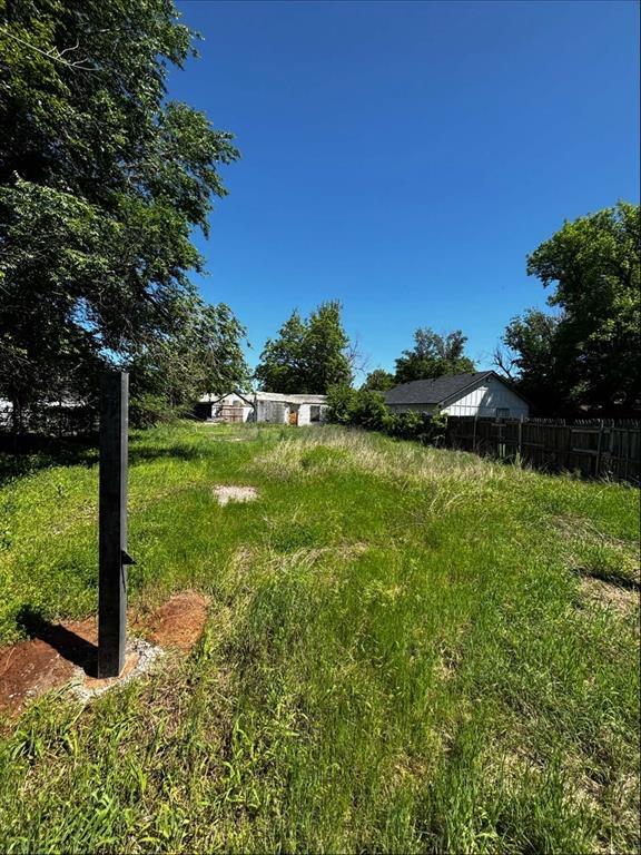 The property at 3029 SW 24th Street is situated in the Rockwood neighborhood of Oklahoma City, offering a blend of residential comfort and urban convenience. This area is characterized by its proximity to major thoroughfares, providing easy access to downtown Oklahoma City and nearby districts