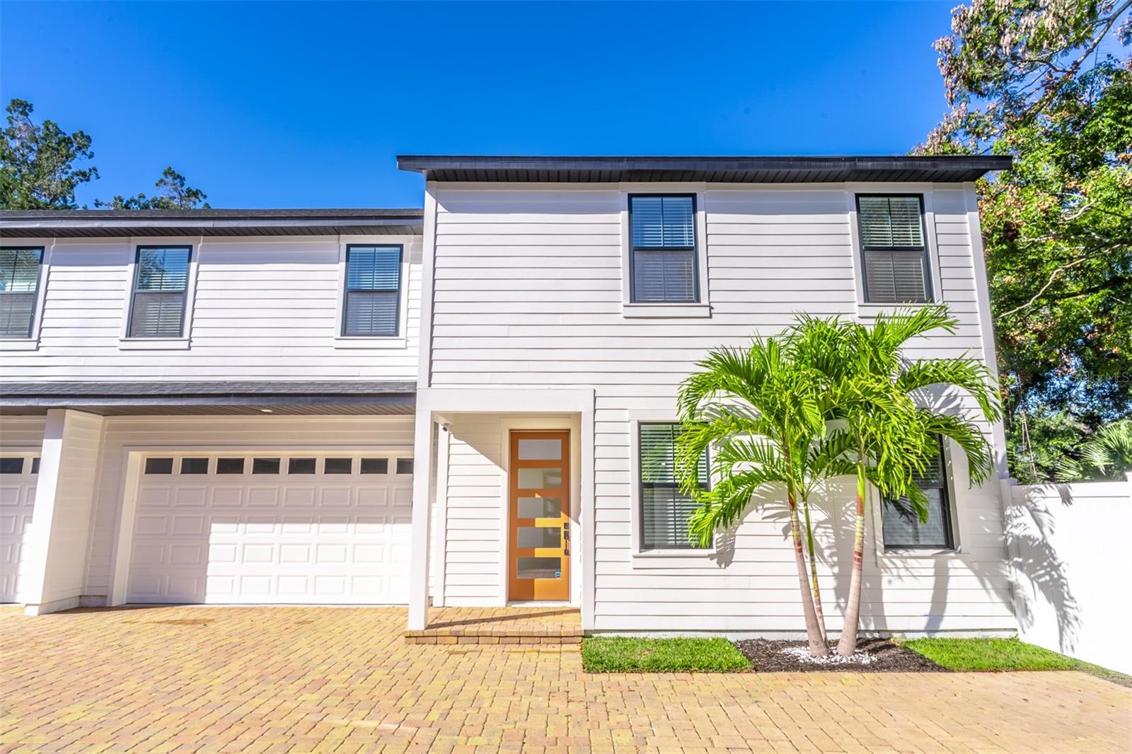 Welcome to your new construction townhome in one of Orlando’s most desirable areas - MILLS 50 District. This 3 bed 2.5 bath townhome spans 1756 sf with a clean open floor plan that includes calypso oak luxury vinyl plank through the entire home. The kitchen has beautiful brown cabinets with upgraded lighting, samsung black slate appliances, large white sink, quartz backsplash, island with quartz plus shiplap that can fit 3 barstools, and half bath with wood cabinet for storage. Large private fenced back yard with gate and mature Oaks as well as a storage room off of back porch. Extra private brick parking spot for this townhome only. The home offers ample windows providing great lighting at all times of the day. Upstairs offers an oversized primary bedroom with a large shower - double sink and walk in closet with built in wood shelf. The other two upstairs bedrooms upstairs share a detached bathroom with a bathtub. You will also find a walk in laundry room with a large window and storage closet. The home includes blinds for every window. An attached two car smart garage with a large window is located off the kitchen. Red brick pavers welcome you home. There is NO HOA. Buy and rent this turn key townhome with high demand and low inventory. Walk to your favorite restaurants and late night spots just feet away (Hawkers, Tori Tori, Wally’s, Plantees, Pigza, First Watch, Santiagos Bodega & So many more new options to come in 2025) Both Audubon Park K-8 School Zone (1.5 mile or 5 min drive)and Lake Highland Prep K-12 (both within a mile and less than a 5 minute drive). AdventHealth (1.5 mile 5 minute drive) No highway needed to get to Downtown Orlando, Baldwin Park, Winter Park, and College Park (All are less then 3 miles or a 10 minute drive away). You never have to leave or go far from home when you live on Weber Street 32803. This townhome is surrounded by single family homes giving it a more neighborhood residential feel. Located in between N Orlando Ave & N Fern Creek Ave. This opportunity won’t last long. Turn key and move in ready.