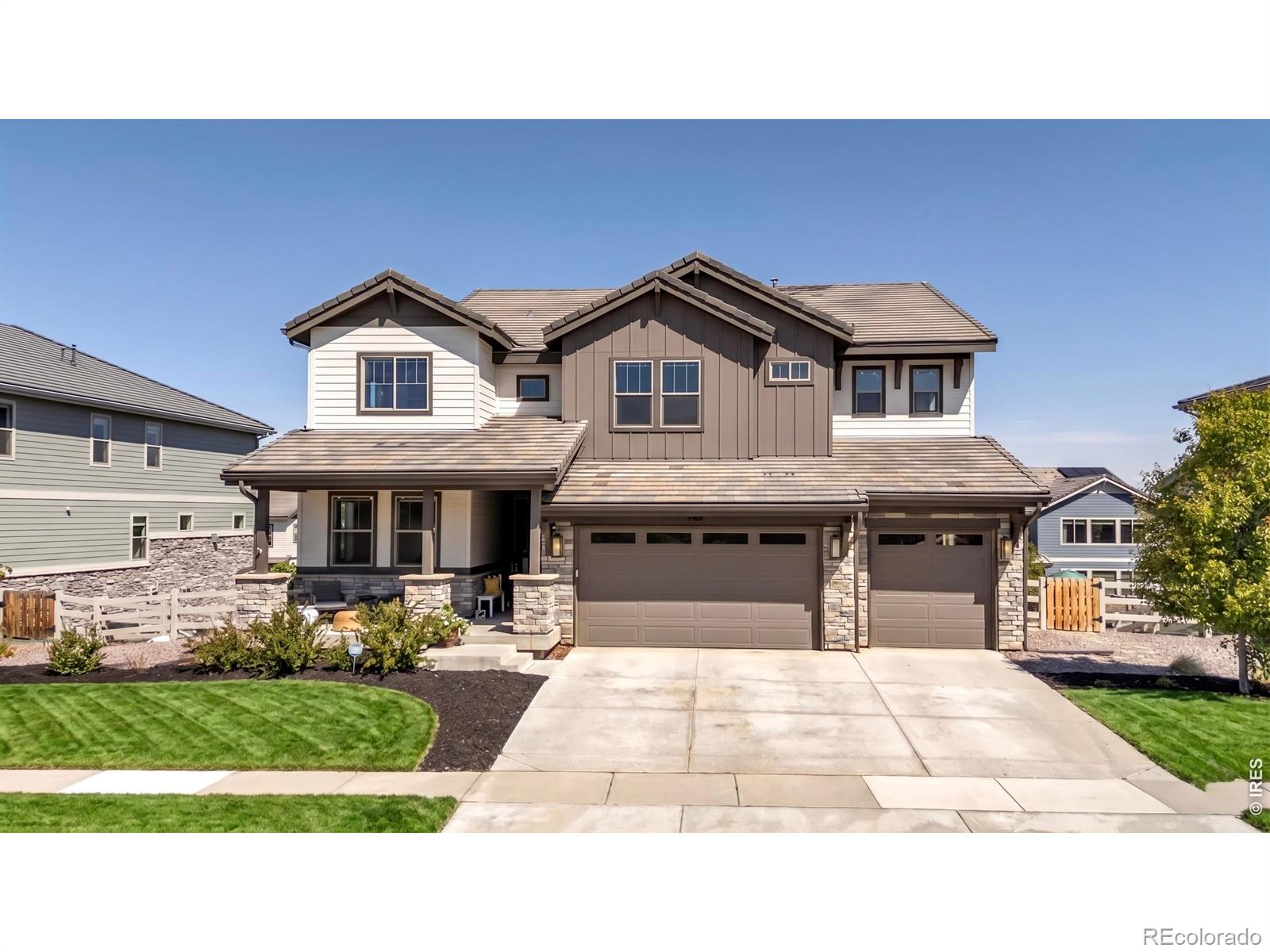 Welcome to Anthem Reserve! This expansive, light-filled home pairs sophisticated style with thoughtful design and a versatile layout in one of Broomfield's most desirable communities. At the heart of the home is a well-appointed kitchen featuring a large island with built-in dining, premium appliances, and a custom wine room. The layout flows naturally into the family room with gas fireplace, creating an ideal space for everyday living and entertaining. An oversized covered patio extends the main living area outdoors and captures terrific Front Range views. Near the entry, a versatile front room works equally well as a formal dining room or sitting area, while the bright main floor office provides an ideal work-from-home setup. Upstairs, the layout is thoughtfully designed for privacy and quiet. The loft and bedrooms are well separated from the main living spaces, minimizing noise transfer from the kitchen and family room below. The primary suite features a perfectly-sized luxury bath and generous walk-in closet with direct access to the laundry room. An en-suite bedroom plus two additional bedrooms connected by a Jack-and-Jill bath complete the upper level. The finished walk-out basement expands the living options with a wet bar featuring a full-size refrigerator and dishwasher, multi-use recreation space, and a fifth bedroom with full bath for guests. A rare four-car tandem garage and wide driveway are integrated into one continuous garage bay configuration for exceptional functionality. Just inside, the oversized mudroom includes a beverage refrigerator, coat closet, cabinetry, and extra counter space creating the perfect landing zone for daily life. Enjoy Anthem's outstanding amenities including a recreation center, pools, fitness facilities, parks, ponds, trails, and neighborhood schools just moments away. Convenient access to DIA, Boulder, plus nearby shopping, dining, and recreation. SHOWINGS BEGIN ON SUNDAY 5/17.