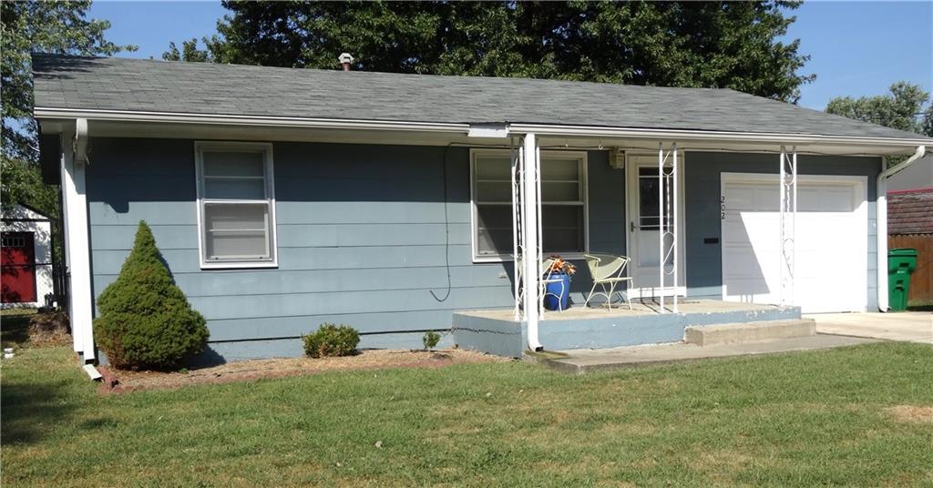 2 BR, 1 Bath, 1 Car Garage, Fenced Back yard. Remodeled in 2020 and is move in ready. Open concept, modern comfort and low maintenance. Lots of natural light. Living Room entry, Kitchen, Laundry and Bath have luxury vinyl plank flooring. Living Room, 2 Bedrooms and hall have carpet. White kitchen cabinets are on 3 walls and kitchen comes with refrigerator, dishwasher, electric range and microwave. In this area in a closet is the gas water heater and gas furnace. Lots of cabinets and counter space and tucked into a corner is a perfect spot for your coffee bar with counter and cabinets above and below. Laundry is off the kitchen and has built in storage and a clothes hanging spot, door to the back yard with concrete patio, and door to the 1 car garage with opener. Concrete driveway is about 3 years old and is 2 cars wide.  The outside has curb appeal with a covered concrete porch. Plenty of space for morning coffee or late evening relaxation. There is even a Mail Drop into the house from the porch. Both bedrooms have custom closets, carpet and blinds. Very functional walk-in-shower with glass doors, pedestal sink, vinyl floor, shelving above stool and also corner shelving.  Step out the back door onto a concrete patio, large shade tree, fenced back yard with chain link on 2 sides and wood fencing on the 3rd. Lg. gate to enter back yard from the front. Very functional lawn building for extra storage. Thompson Street is a very quiet street and not well traveled. Very peaceful. You will enjoy the area close to walking trails and easy access to shopping. Come see for yourself. Call the listing agent for a private showing. Occupied but easy to view.
