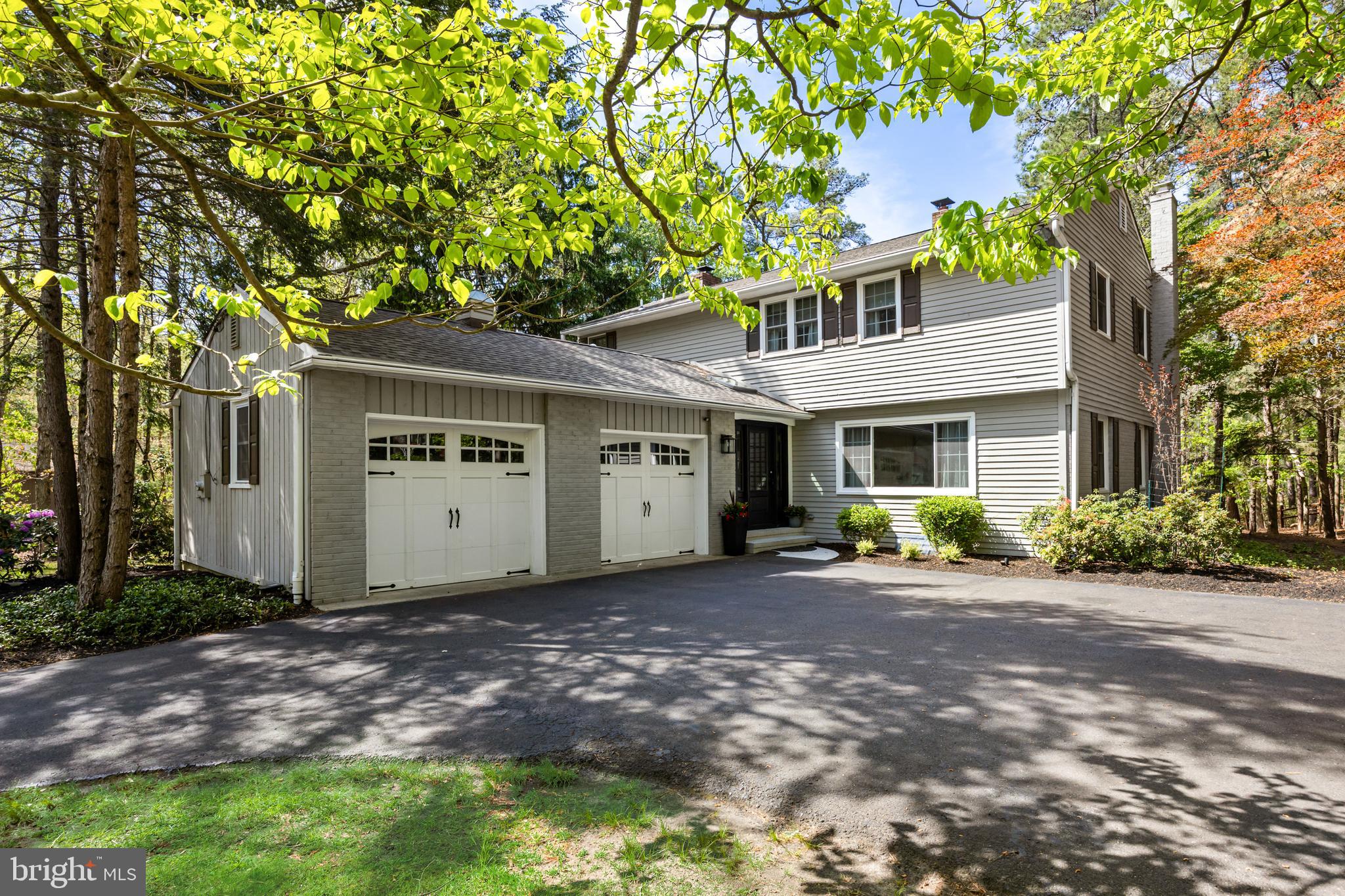 Luxury lake living on Mimosa Lake in one of Medford’s most desirable neighborhoods. Welcome to 41 Pontiac Drive, a beautifully maintained 4-bedroom, 2.5-bath home offering over 3,200 square feet of thoughtfully designed living space with approximately 55 feet of lake frontage.Set back off the road with a winding circular driveway, this home offers both privacy and a grand first impression. Inside, a wall of windows along the back of the home showcases breathtaking views of Mimosa Lake, filling the living spaces with natural light and creating a peaceful backdrop for everyday living and entertaining. Enjoy water views from both the living room and kitchen, while the inviting kitchen also features a cozy fireplace. The spacious layout offers comfort, functionality, and timeless charm throughout, with a finished basement providing additional flexible living space perfect for a media room, gym, playroom, or home office.Designed to embrace indoor-outdoor living, the home features a screened porch, patio with hot tub, and a walkway leading directly to the lake. The private setting creates the perfect atmosphere for relaxing or entertaining guests by the water, offering seamless indoor-outdoor entertaining year-round.Combining space, privacy, lifestyle, and an exceptional waterfront location, this is a rare opportunity to own a true Medford retreat on Mimosa Lake.Enjoy swimming, kayaking, fishing, or simply relaxing from your own private lakefront backyard setting on Mimosa Lake.