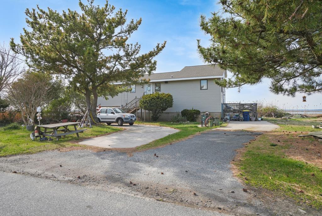 Waterfront home being sold as is. Incredible sunsets! Home needs repairs and the dock needs to be replaced. Tenant occupied. No interior photos