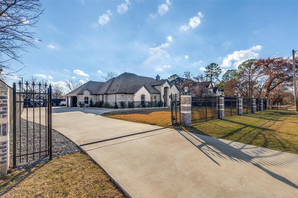 Stunning one-and-a-half-story home built in 2021, ideally located in one of Arlington’s most desirable areas—just 5 minutes from Lake Arlington.This exceptional property offers 4 spacious bedrooms, 3.5 bathrooms, and a rare 3-car garage, all situated on an almost half-acre lot.Designed with flexibility in mind, the private study can easily be converted into a fifth bedroom, while the upstairs fourth bedroom features its own full bathroom, making it perfect for a game room, guest suite, or multi-generational living. You’ll love the open-concept kitchen and living area, ideal for both everyday living and entertaining. The expansive backyard provides endless possibilities—plenty of space to create your dream outdoor entertainment area, add a pool, or design a custom sports court. The long driveway offers ample parking, a rare find in this area.Homes built in 2021 on nearly half an acre in this prime Arlington location are extremely hard to find. This is a truly unique opportunity—and this home will not last long.