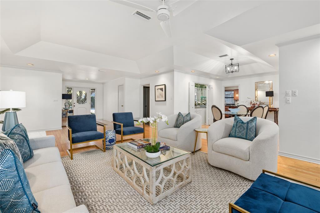 Unparalleled views of the Trinity River and Trinity Trails set the stage for this serene one-story home. Tucked away on a premier cul-de-sac lot in the Woods of Overton Woods, providing lush surrondings. Inside, the spacious layout is warm and inviting. The large living room centers around a fireplace and features wood floors and windows that frame breathtaking river views. The living room flows seamlessly into the dining area, which connects to a well-appointed kitchen with granite countertops, abundant cabinetry, and a breakfast room with built-ins. A second cozy living room extends from the breakfast area, offering expansive views of the backyard, Trinity River and immediate access to the Trinity Trails. The private primary suite includes an ensuite bath with dual sinks, a large shower, and two walk-in closets. Two additional bedrooms, each with walk-in closets, provide comfort and versatility. Ample storage is thoughtfully incorporated throughout the home. Outdoors, a patio shaded by mature trees creates a picturesque setting to relax or entertain while overlooking the serene backdrop of the river and trails. Enjoy walkability to the Trinity Trails, restaurants, shopping and more.