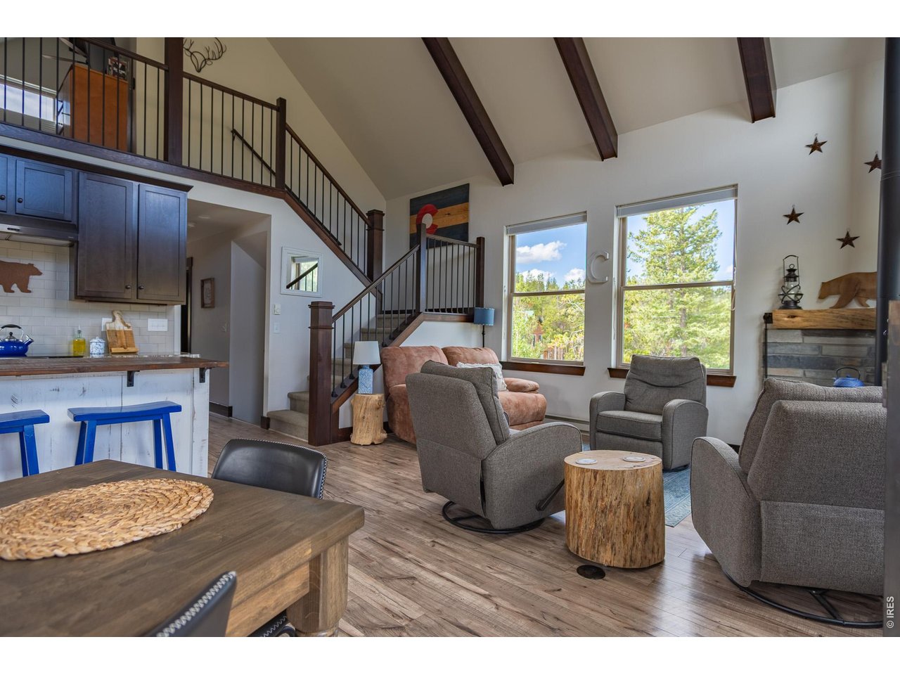 Just over an hour NW of Fort Collins and in the sought after mountain enclave that is Crystal Lakes, this beautiful RIVERFRONT mountain home on just under 1.5 acres just might surprise you. With over 2100 sqft of usable space on 3 levels, this well thought out home brings nature indoors. Positioned perfectly on the property, and with large windows to bring in the views, there is room for family and guests to enjoy the Colorado mountains year round. This parcel is sloped toward the North Fork of the Poudre River, with frontage on both sides, and the home is positioned perfectly to take advantage of the topography and the views. Surrounded by towering pines, mountain views and the sound of the river, you're transported into a place that gives you respite from the everyday. National Forest surrounds you and there is access in a multitude of places for you to enjoy all that has to offer. Even though you'll feel miles away from civilization, you're only about 15 minutes from Red Feather where a grocery/hardware store has many essentials. There are even a couple of restaurants and a post office as well. The home, built in 2018, is modern and incredibly designed. The main floor is the full footprint of 864 sq feet with nearly 400 sqft additional in the spacious loft with half bath. The full footprint, walk-out basement is technically unfinished but has built in queen size bunks, washer/dryer, and a second family/game area. Overall you have over 2100 sqft on 3 levels for incredible family space. Outside, the current owners have created a beautiful relaxing patio area , plus upper deck, lower basement patio and walkway to the river that allows full enjoyment of the beautiful Colorado outdoors. There is also an 8'x14 storage shed to house all your tools and outside toys. You can also enjoy a 4 in-ground firepit with bench and picnic table. Something else that is always a huge item is an RV space that has 50amp service and a waste line into the septic system.