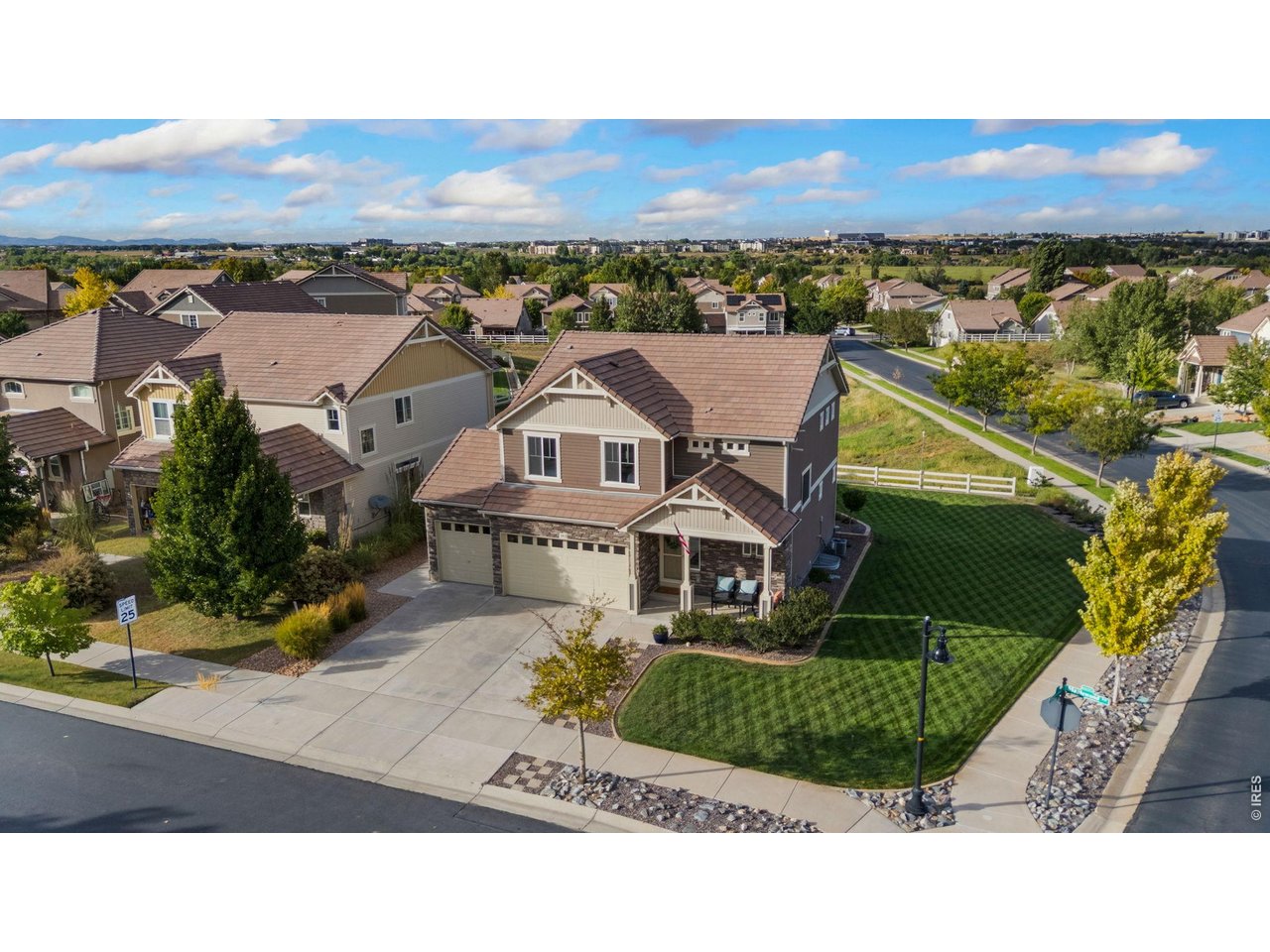 Lovingly cared for by its original owners and ideally positioned on a premium corner lot in the sought-after Thompson River Ranch community, this inviting 3 bedroom, 2.5 bathroom home is highlighted by thoughtful landscaping and a showstopping outdoor space. Inside, accent windows fill the home with natural light and an open concept layout creates an easy flow for gathering. A modern eat-in kitchen features quartz countertops, stainless steel appliances, plenty of cabinets, a roomy pantry, and a generous island for dining and hosting friends. An open loft adds a layer of possibility upstairs, whether you envision it as a home office, playroom, or a second living area. Unwind in the primary bedroom, overlooking open space behind, and enjoy an en suite with a double vanity, extra storage, and a spa-like walk-in shower. With two secondary bedrooms and an additional full bathroom, there's plenty of room to spread out for busy households or overnight guests. Offering valuable potential for recreation and storage, an unfinished basement provides more space that can grow alongside your needs. Step outside to discover a dreamy backyard that is built for making memories. This coveted corner lot is designed with low-maintenance living in mind and an included robot lawn mower makes keeping the yard looking its best even easier. Relax under the covered patio, gather around a bonfire, soak in the hot tub, and entertain in the outdoor kitchen while you enjoy evenings that make you grateful to be home. Thompson River Ranch offers a lifestyle built around connection. Spend afternoons at the pools, explore paved trails, exercise at the clubhouse, venture to the playgrounds and disc golf course, or meet neighbors at community events. With Riverview PK-8 School within the neighborhood and immediate access to Loveland, Centerra, and I-25, you can enjoy the ease of having shopping, dining, and entertainment close by while coming back to a place that simply feels like home.