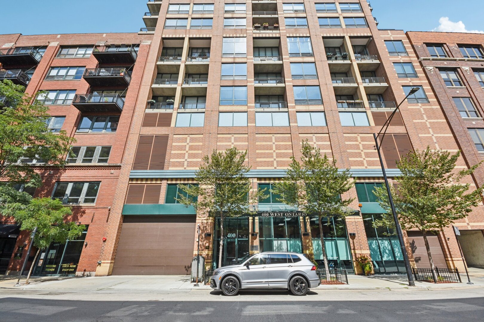 Experience city living at its finest in this 3-bedroom, 2.5-bath River  North showplace, soaring above the skyline on the 12th floor with two  private balconies offering breathtaking, unobstructed views from every  room.  A spacious foyer with gallery walls for your art and collections sets  the stage for a home that blends sophistication with comfort. The  kitchen, appointed with a deep stainless-steel sink and brand new  stainless steel appliances, opens seamlessly to the dining and living  areas. The result: a bright, airy, open-concept space that's as  perfect for entertaining as it is for everyday living.  The primary suite is a true retreat, featuring an oversized walk-in  closet with custom shelving and a spa-inspired bath with jacuzzi tub,  glass-enclosed shower, and sleek vanity.  Enjoy the convenience of in-unit laundry. The building features a fully equipped gym and 24-hour doorperson service.  Step outside to the vibrant heart of River North-where world-class dining, shopping, nightlife, Whole Foods, public transit, and the Chicago Riverwalk are all at your doorstep.