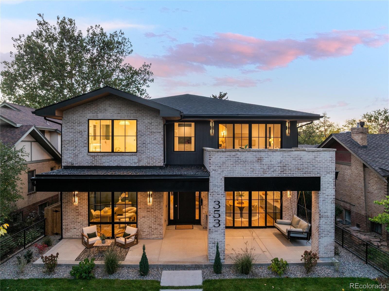 This modern coastal masterpiece, newly built in 2025 by Cottage Contractors, brings the Coastal lifestyle to one of Wash Park’s most sought-after tree-lined blocks. Situated on a quiet rare, oversized lot just a block and a half from the park, the home offers 6,371 sq. ft. of refined living, designed with a balance of warmth, elegance, & thoughtful detail. 
The main level flows seamlessly from the grand dining room, which includes custom cabinetry, wallpapered accent wall & the private study complete w/tongue & groove ceiling, custom trim work & custom iron doors, into an expansive kitchen & great room framed by custom Pella windows. An entertainer’s dream, the kitchen features a 48" Wolf range w/double ovens, a Sub-Zero 60" paneled refrigerator/freezer, Miele built-in coffee maker, butler’s pantry w/paneled Sub-Zero wine fridge, & custom Heartwood cabinetry. Natural light pours into the sunroom with its built-in banquette and tongue & groove ceilings. 
Upstairs, the serene primary suite offers a private balcony w/Trex deck nestled in the trees, custom coffee bar, spacious closet w/ custom closet system, a spa-worthy bath w/honed Calcutta Oro tile, radiant floors, a Jacuzzi soaking tub, steam shower, and Kohler intelligent bidet. 3 additional ensuite bedrooms complete the upper level. 2 of the rooms w/ private balcony & mountain views! All w/walk in closets! 
The lower level is designed for relaxation & entertaining. Wine room with custom arched iron French doors, guest suite, designated gym w/rubber flooring & wall to wall mirrors, great room w/wet bar and island, dishwasher, beverage fridge & custom built-ins. Outdoors, the home offers landscaped grounds, a fenced yard, pergola-covered patio, outdoor built in BBQ with prep area, and oversized garage with EV charging and lift-ready clearance. Front porch w/bed swing!
This is Wash Park’s most exciting new build of the year.  Effortless sophistication with a bit of Santa Barbara in the heart of Wash Park.