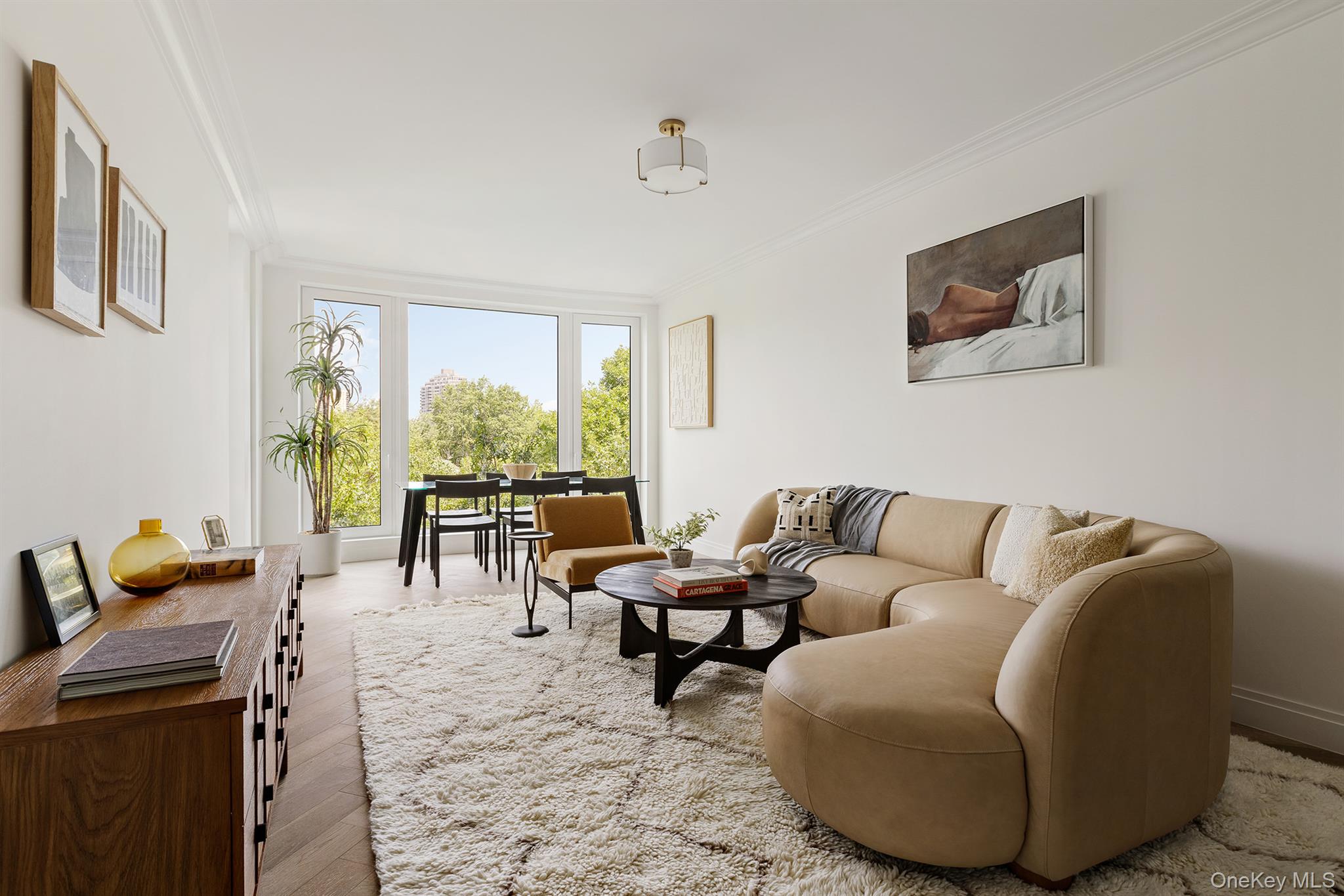 78-29 Austin StreetPenthouse 2AIntroducing Penthouse 2A, an impressive three-bedroom, two-and-a-half bathroom penthouse residence spanning 1,632 square feet. With interiors by Italian design firm S20M, Penthouse 2A features dramatic ceiling heights up to 10 feet tall. White Oak herringbone wood floors and spectacular custom wall paneling run throughout the primary living spaces, while the gracious living room is punctuated with floor-to-ceiling triple glazed windows. The custom Scavolini kitchen features a best-in-class integrated suite of Viking appliances, including an induction cooktop with Savalo marble hood, refrigerator, dishwasher, and microwave. Glass upper cabinets with undermount lighting are paired with Italian Calacatta marble countertops. The private primary bedroom suite features an expansive walk-in closet and a tranquil en-suite bath. Anchored by a dual Porcelanosa vanity, the primary bathroom is equipped with Robern medicine cabinets, designer wall sconces, and wall mounted Toto toilet. The secondary bedrooms are provided with ample closet space and are adjacent to the secondary bathroom and powder room.Penthouse 2A is equipped with a vented washer and dryer and a dedicated entry closet, while the private concierge closet provides the ultimate convenience. Nestled in the charming Forest Hills neighborhood, The Austin is a remarkable collection of 98 condominium residences. A transformative new development where every detail is exquisitely designed from the ground up, The Austin transcends the condominium status quo with outstanding craftsmanship and world class amenities, surrounded by abundant tranquil green spaces. Spanning Austin Street to Kew Forest Lane, this offering rivals anything else found in Queens.The Austin offers a refined collection of resort-style amenities designed to enhance everyday living. Residents are welcomed by a full-time doorman and concierge, with inviting spaces including a residents’ lounge with garden views, a residents’ library, and a vibrant children’s playroom and music room. The state-of-the-art fitness center features cardio and strength equipment, a stretching studio, spa, and indoor basketball court. Two fully amenitized rooftop levels include an outdoor saltwater junior Olympic pool, pickleball court, outdoor cinema, and outdoor kitchen and dining areas with panoramic views of Manhattan and Queens. Additional conveniences include a live-in superintendent, pet spa, as well as private parking and private storage available for purchase.The complete offering terms are in the offering plan available from Sponsor, 78-29 Austin Street Holdings LLC, having an address at 227 Sea Breeze Avenue, 4th fl., Suite C-403, Brooklyn, NY 11224, File No. CD23-0253. All artist’s renderings are for representational purposes only and are subject to variances. Finishes depicted in the artist’s renderings are not necessarily indicative of what will be specified in the offering plan and not all items included in the artist’s renderings are included in unit purchase. Equal Housing Opportunity.
