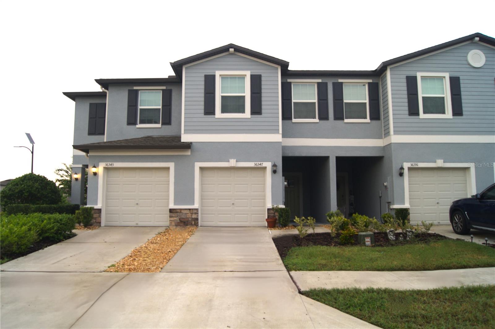 Opportunity meets value in Abbott Square! This 2024-built, 3-bedroom, 2.5-bath townhome offers 1,634 square feet of living space and a thoughtfully designed two-story floor plan at an attractive price point. The main level features an open living and dining area connected to the kitchen, creating a comfortable space for everyday living and entertaining. Upstairs, you'll find all three bedrooms, including a spacious primary suite, plus a convenient laundry area.What makes this opportunity stand out is the combination of newer construction, functional space, and an extensive community amenity package. Abbott Square residents enjoy access to a large swimming pool, clubhouse, fitness center, game room, playground, BBQ areas, scenic walking trails, green spaces, peaceful sitting areas, and a gazebo. *Internet and cable are included in the HOA*, adding additional convenience and value.The home also includes the kitchen appliances, making it easy to move in and make the space your own. Ideally located in Zephyrhills with convenient access to shopping, dining, recreation, major roadways, and the surrounding Tampa Bay area.At $260,000, this is an opportunity to own a 2024-built townhome with a garage and an impressive list of community amenities without paying new-construction pricing. Schedule your showing and see the value for yourself.
