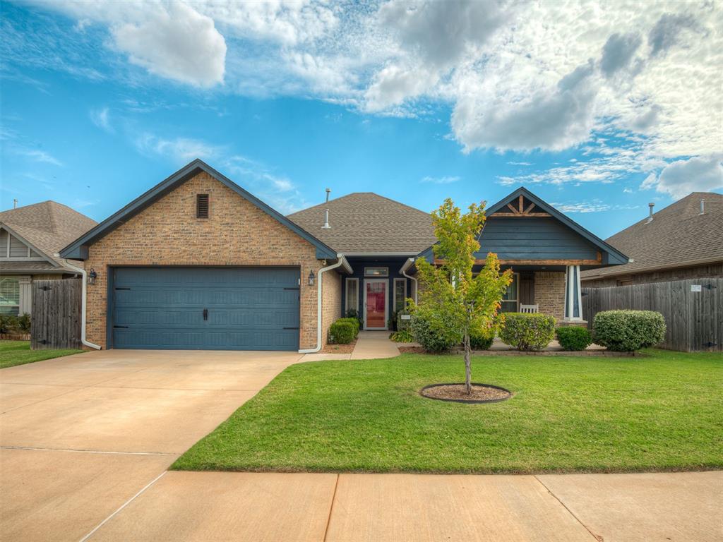 Don't miss out on this gorgeous pinterest worthy home in Mustang Schools!
This beautiful 3-bedroom, 2-bath home features soaring 10-foot ceilings and a large, cozy living room centered around a stunning stone fireplace. The open concept design flows into the chef's kitchen showcasing white cabinets, gas stove, stainless appliances, marble-look granite countertops, a massive center island with bar seating, eat in kitchen, and a huge walk-in pantry with built-ins. Light wood-look tile floors run throughout the main living areas and kitchen, creating bright and easy to maintain spaces. The primary suite is tucked in the back of the home and includes a spacious walk in closet and an ensuite bathroom with whirlpool tub, separate shower, double vanity with marble-look granite, and plenty of built-in storage. The two additional spacious bedrooms are located at the front of the home, both with access to the second bathroom. A large laundry room with a mud bench adds everyday convenience, while the 2 car garage offers built-in shelving and a door to access the backyard. Step outside to your own backyard oasis complete with an extended covered patio, fire pit, and above-ground pool perfect for entertaining or relaxing. The neighborhood also offers a playground and sidewalks for easy walks and meeting your neighbors. This home is move-in ready and waiting for you!