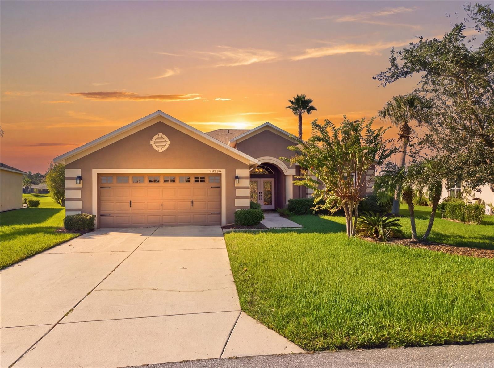 Welcome to this beautiful home in the highly desirable 55+ community of Tampa Bay Golf and Country Club! Situated on a PREMIUM lot with golf course views from both the front yard and back patio. This home combines comfort, privacy, and the best of Florida living. Enjoy lush landscaping and a roof replaced at the end of 2024! Step through the arched entryway and double front doors into an inviting, open floor plan featuring a wall of sliding glass doors overlooking the covered lanai and scenic golf course.The spacious primary suite offers an oversized en-suite bathroom with dual sinks, a walk-in closet, a private shower, and a soaking tub. An adjoining bedroom is perfect for an office, den, or guest room. The split-bedroom floor plan provides added privacy, with a third bedroom and second bathroom located on the opposite side of the home.The kitchen features granite countertops, stainless steel appliances, a generous pantry, and an eat-in nook, with easy access to the dining area. There is ample storage throughout, and a two-car garage adding to everyday convenience.The covered lanai is a true highlight! Enjoy your morning coffee, a gentle breeze, and peaceful golf course views while watching the local wildlife. The amenities are unmatched! Enjoy an 18-hole Championship Golf Course, a 9-hole Executive Course, driving range, two community pools, tennis courts, dog parks, clubhouse, full-service restaurant, fitness center, card room, and so much more!Located in peaceful San Antonio, you're just 10–15 minutes from Wesley Chapel's premier shopping and dining, including Tampa Premium Outlets, and approximately 35 minutes from Tampa International Airport.Enjoy the perfect blend of golf course living, resort-style amenities, and a peaceful Florida retreat!