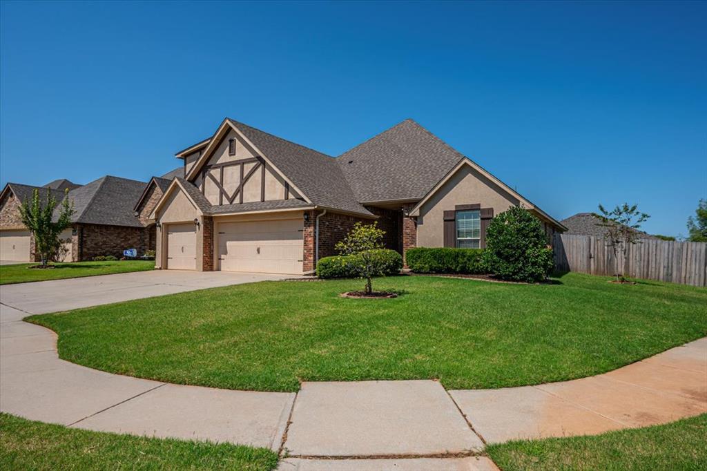 Terrific home in the Lone Oak Lakes addition, Deer Creek Schools.  Features include four bedrooms, two full baths downstairs, large upstairs bonus room with half-bath, covered patio with brick fireplace, three car garage w/storm shelter.  Large corner lot with above ground salt water pool w/pump and sand filtration. Tankless water heater. Primary bath has Jacuzzi tub, dual vanities, walk-in shower, huge closet.  This home has new carpet, tile, paint, appliances, light fixtures, hardware,  granite, plumbing fixtures, ceiling fans, smoke alarms and more.  The Lone Oak Lakes gated community includes a playground/park. Truly a special home.