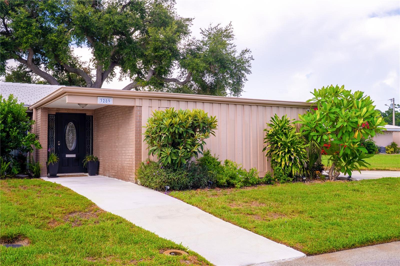 Welcome to 3289 Fairhaven Lane. Discover this stunning and serene condo that perfectly blends comfort, style and a modern, inviting atmosphere. Nestled in the heart of Bee Ridge, Sarasota, Florida this home offers a spacious layout and thoughtful upgrades for a truly enjoyable lifestyle and one floor living. This beautifully maintained property features 2 spacious bedrooms, 2 bathrooms, and 1,470 square feet of elegant living space designed for comfort and relaxation. Property Highlights: • Spacious Living: A large primary suite features a well-appointed walk-in closet, while the lovely guest room includes a bright and airy guest bathroom. • Convenience & Comfort: Laundry is conveniently located near the kitchen, and an attached one-car garage adds extra ease to daily living. • Relaxing Spaces: Enjoy your morning coffee by the gorgeous hand-tiled fireplace (electric) or unwind on the expansive lanai, featuring new flooring and incredible natural light. •Tile Roof Replaced in 2020 with transferable Warranty  • Resort-Style Amenities: Step out your back door to the sparkling pool, ideal for relaxing afternoons or entertaining friends. • Fresh Updates: With brand-new flooring, appliances, and fresh paint, this home is move-in ready and boasts a modern touch. • Prime Location: Situated just 6 miles from the award-winning Siesta Key Beach, you’ll have easy access to Sarasota’s vibrant dining, shopping, and cultural attractions. Additional Note: This property has sustained no damage from recent hurricanes, ensuring peace of mind for new homeowners. Embrace the vibrant Florida Gulf Coast lifestyle in this unusually spacious and elegant residence. With its fresh updates and resort-style living, this home invites you to experience the ultimate in comfort and convenience. Live the Sarasota lifestyle.  Don’t miss out on this exceptional opportunity—schedule your tour today!