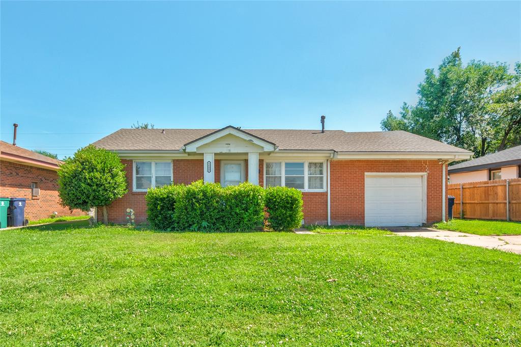Charming all brick ranch with great bones, brand-new roof installed July 2025, and a $3,000 seller credit for the flooring of your choice. Step onto the covered front porch and into a bright living room highlighted by a picture window that fills the space with natural light. The sunny eat-in kitchen offers abundant cabinetry, gas range, tiled counters and backsplash, plus a cheerful dining nook. Two flexible bedrooms include a generous primary and a secondary room perfect for guests, office, or nursery. The full bath is clean and functional with a tiled tub-shower combo and plenty of storage. Central heat and air, laundry hookups in the garage, and an attached one-car garage add everyday convenience. Out back, enjoy a fully fenced quarter-acre lot with mature trees ideal for pets, gardening, or future additions. A little cosmetic TLC and your new flooring will create instant equity. Minutes to I-44, shopping and dining on SW 59th, Will Rogers Airport, Boeing and FAA campuses, and only fifteen minutes to downtown OKC. Move-in ready today, equity builder tomorrow—schedule your private showing today!