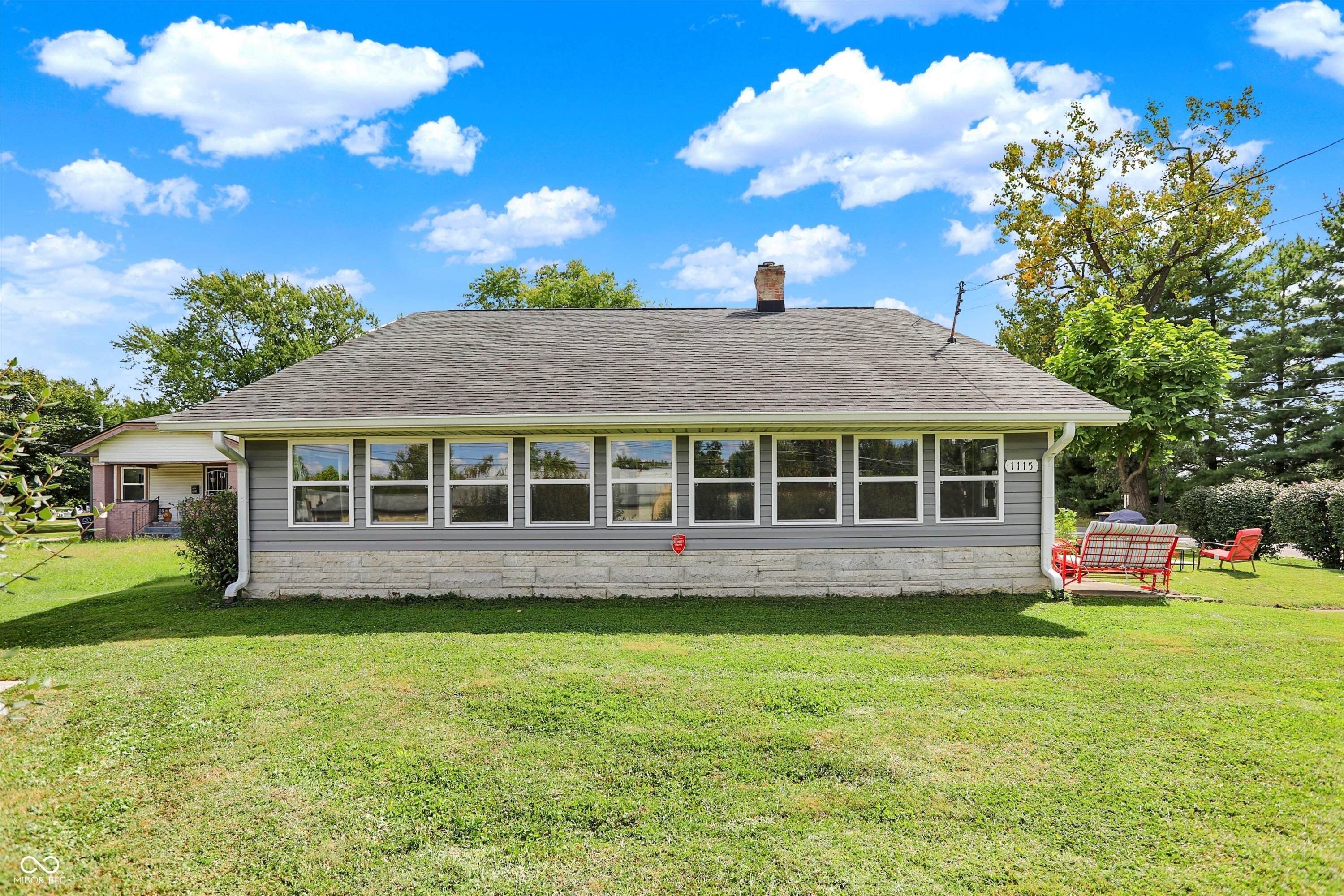 A rare 4 bedroom, 2400 sq ft + find in Beech Grove. This beauty has so much to offer!! Space galore inside and out!  Walk into large great room that can be used for any purpose ; family gatherings, in-law quarters, office, mud room , anything your heart desires. Formal dining room, large bedrooms, formal living room and the perfect outdoor oasis. Spend evenings in the large fenced yard (over .65 acres to be exact) or relaxing in the heated and cool sunroom .  Updates include; newer windows throughout, updated flooring in living and bedrooms, stainless steel kitchen appliances and newer exterior doors. A beautiful and producing garden, outdoor 2 car garage, storage shed and so much more. This quiet location is across the street from the Benedict Inn making for even more peaceful surrounding. You won't want to miss this one!