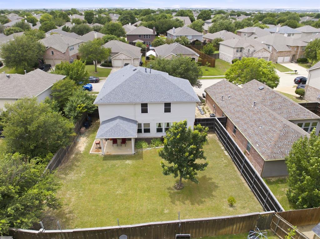 Welcome home to a beautifully maintained one-owner home where pride of ownership shines throughout! This spacious 4-bedroom, 2.5-bath home offers an inviting open-concept layout designed for both everyday living and entertaining. The living room, dining area, and kitchen flow seamlessly together, creating a warm and functional space for gathering with family and friends.The main level features durable ceramic tile flooring throughout, along with fresh interior paint that gives the home a clean, bright, move-in-ready feel. Energy-efficient features include a radiant barrier and solar-powered attic fan, helping improve comfort and efficiency year-round. A water softening and filtration system is also included for added convenience.Step outside to discover a large backyard with plenty of room to make it your own perfect for outdoor gatherings, play, gardening, pets, or simply enjoying the Texas sunshine.Ideally located in highly sought-after Keller ISD, this home offers easy access to shopping, dining, entertainment, medical facilities, and major commuter routes. The neighborhood also offers desirable amenities, including a community pool and playground.Well cared for, thoughtfully updated, and ideally located, this home is ready for its next owner to make it their own. Don't miss the opportunity to make this Keller-area gem your new home!