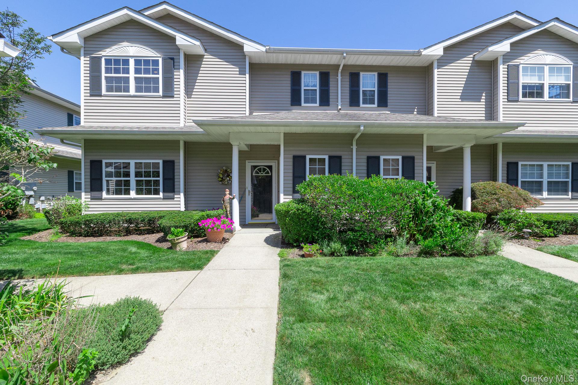 Welcome to Eagles Walk, a premier gated 55+ community in the heart of East Quogue offering exceptional value in the Hamptons. This beautifully maintained home features an open-concept layout, a bright kitchen with a skylight, and a spacious living and dining area perfect for relaxed living. The primary suite includes a private full bath, while the versatile guest bedroom/office opens via sliding glass doors to a private back deck. Complete with a detached garage and an additional assigned parking spot right in front.Enjoy top-tier community amenities just steps away, including a heated saltwater pool and a clubhouse equipped with a gathering area, kitchen, and fitness equipment. Ideally situated between Westhampton Beach Village and Hampton Bays, you are minutes from local dining, beaches, and shopping. Enjoy the ultimate Hamptons lifestyle at an unbeatable price!
