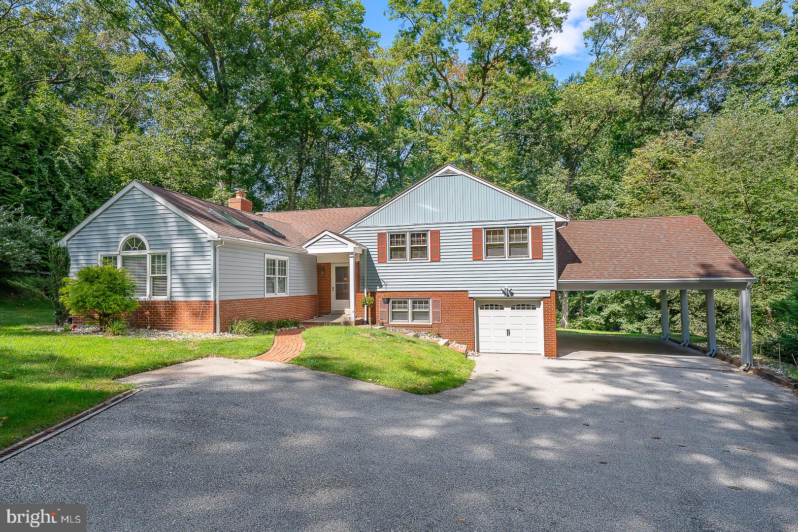 Welcome to this spacious four-bedroom home, with 3.5 baths. The first floor has a living room, a separate larger great room with a cathedral ceiling, and a modern kitchen that opens to the dining room. The dining room leads out to a 20' x 30' updated deck. The second floor has three bedrooms. The master bedroom has an attached bathroom with a walk-in shower, as well as an oversized walk-in closet. There is a second full bath on this floor as well, along with the two other bedrooms. The hallway has pull-down stairs that lead to a floored attic for plenty of storage. The third floor has another larger bedroom with an attached full bath and large closet. Stepping down from the 1st floor kitchen you enter a spacious family room for additional entertaining. The family room has its own powder room, and access to the garage as well as access to the yard at ground level. Also from the family room is another set of stairs that leads down to an 800 sq ft unfinished basement for storage and work room, and it is equipped with French drain and sub pump. (Very dry!) In this bottom level basement, there is also open access to the concrete crawl space that sits under the 1st floor great room which can be used for additional storage. In addition to the garage, there is a carport that can accommodate four cars if necessary. It should also be noted that just across King of Prussia Road sits the 89-acre McKaig Nature Center, with many trails and environmental programs available. It is truly a hidden gem in Upper Merion Township. Needless to say, there is plenty of room for growth in this spacious, move-in ready home that is ideally located so very close to nature, transit (R-5 Regional Rail) and shopping.
