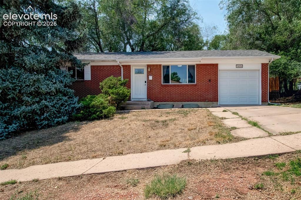 WELCOME HOME to this charming ranch-style home nestled on a spacious lot shaded by beautiful mature trees in an established neighborhood with no HOA! Built in 1961 and thoughtfully updated over the years, this move-in ready home offers 1,700 square feet of comfortable living space, blending timeless character with modern conveniences. The expansive backyard provides plenty of room to garden, entertain, play, or simply unwind beneath the shade of the towering trees. Inside, natural light fills the welcoming floor plan featuring fresh interior paint, newer luxury vinyl plank flooring throughout much of the home, upgraded light fixtures, switches, and outlets, and a smart thermostat for added comfort and efficiency. The spacious living room flows seamlessly into the dining area with walk-out access to the backyard, creating the perfect setting for everyday living and entertaining. Offering 4 bedrooms, 2 bathrooms, and a fully finished basement, the flexible layout provides space for everyone. The expansive lower-level family room is ideal for movie nights, a game room, home office, fitness space, or whatever fits your lifestyle. The attached garage and generous storage areas make staying organized easy and everyday living even more convenient. Enjoy peace of mind knowing many of the major improvements have already been completed, including a new roof and gutters (2023), an upgraded electrical panel (2024), and replaced furnace, allowing you to focus on settling in instead of tackling costly projects. Ideally situated in the heart of Colorado Springs, this home offers easy access to the Powers Corridor, Academy Blvd, downtown, parks, schools, shopping, dining, and entertainment, making everyday errands and commuting a breeze while still enjoying the charm of an established neighborhood. Whether you're purchasing your first home, looking for more space, or simply searching for a move-in ready home with room to grow, this sweet ranch is ready to welcome you home.