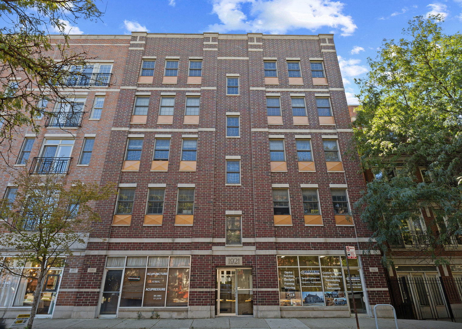 Step inside this beautifully appointed West Lincoln Park condo and experience thoughtfully designed living space where custom detailing and comfortable living come together. Upon entry, the millwork immediately sets the tone, with crown moldings, six-inch baseboards, chair rails, two-panel doors, and hardwood floors throughout. The open living area offers an inviting place to relax or entertain, anchored by a gas-starting, gas-log fireplace with a handsome slate surround and an in-ceiling five-point surround sound system adds to the atmosphere while a built-in butler pantry with granite counter, mosaic backsplash and cherry cabs creates an elegant and practical space for coffee, wine or entertaining. The open flow leads naturally into both gracious dining space with room for a full table and sideboard as well as the beautifully appointed kitchen designed for both everyday living and entertaining featuring a generous center island with storage and breakfast bar, granite countertops, glass mosaic backsplash, Grohe faucet, custom lighting, Viking professional stainless appliances and abundant mocha-stained cherry cabinetry. Down the hall, the spacious primary suite provides a peaceful retreat, highlighted by an inset cove ceiling, custom lighting, tailored honeycomb shades and exceptional storage with dual professionally organized wall and walk-in closets. The adjoining primary bath delivers a spa-like experience with slate flooring, marble counters, double undermount sinks, custom vanity lighting, a glass-enclosed shower and separate jetted soaking tub, complemented by rich cherry cabinetry. Two additional roomy bedrooms offer flexibility for family, guests or a home office and share a stylish hall bath with slate finishes, stone counter, custom lighting and glass-enclosed tub. From the primary suite, step outside to the generous balcony - an inviting extension of the living space featuring custom programmable Hue Festiva lighting for enjoyable evenings outdoors. Additional conveniences include concrete ceilings for privacy and sound protection, tailored window treatments throughout, a full-size LG Washtower with steam, Nest-controlled HVAC, security system, shared storage and an on-site assigned exterior parking space. All this in an elevator accessible, pet-friendly, self-managed building with secured entry and video surveillance. Ideally positioned in West Lincoln Park, just steps from the heart of Roscoe Village and walking distance to all the restaurants, shopping, transportation and neighborhood amenities you could ask for! In addition, live within the boundaries of Prescott Elementary and Lincoln Park International Baccalaureate High School and enjoy an easy commute to the Brown Line, CTA buses and quick expressway access. This one is a gem!