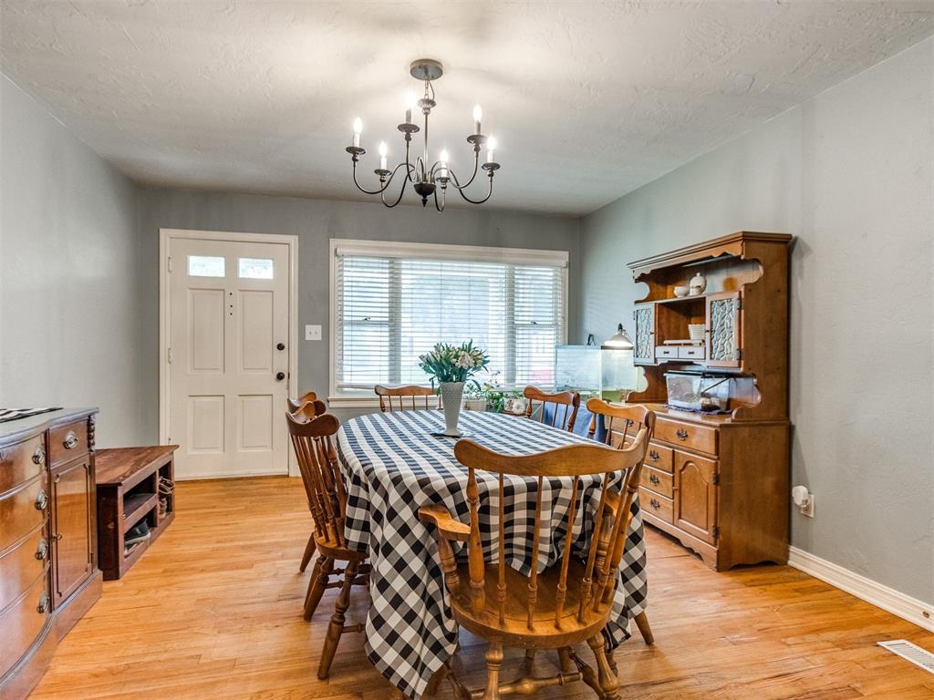 This 3-bedroom, 1-bath home in Norman offers 1,499 sq ft of interior space and sits on a spacious corner lot. Inside, two living areas provide flexibility for entertaining, working from home, or relaxing. Step out to the covered patio, perfect for enjoying the outdoors year-round. The large backyard includes multiple outbuildings, with a standout metal shop featuring a walk-through and sliding overhead door—ideal for tools, hobbies, or extra storage. Notable updates include a new roof in 2021 and new gutters with leaf guards for low-maintenance living.  Conveniently located to nearby amenities and within walking distance of a city park.